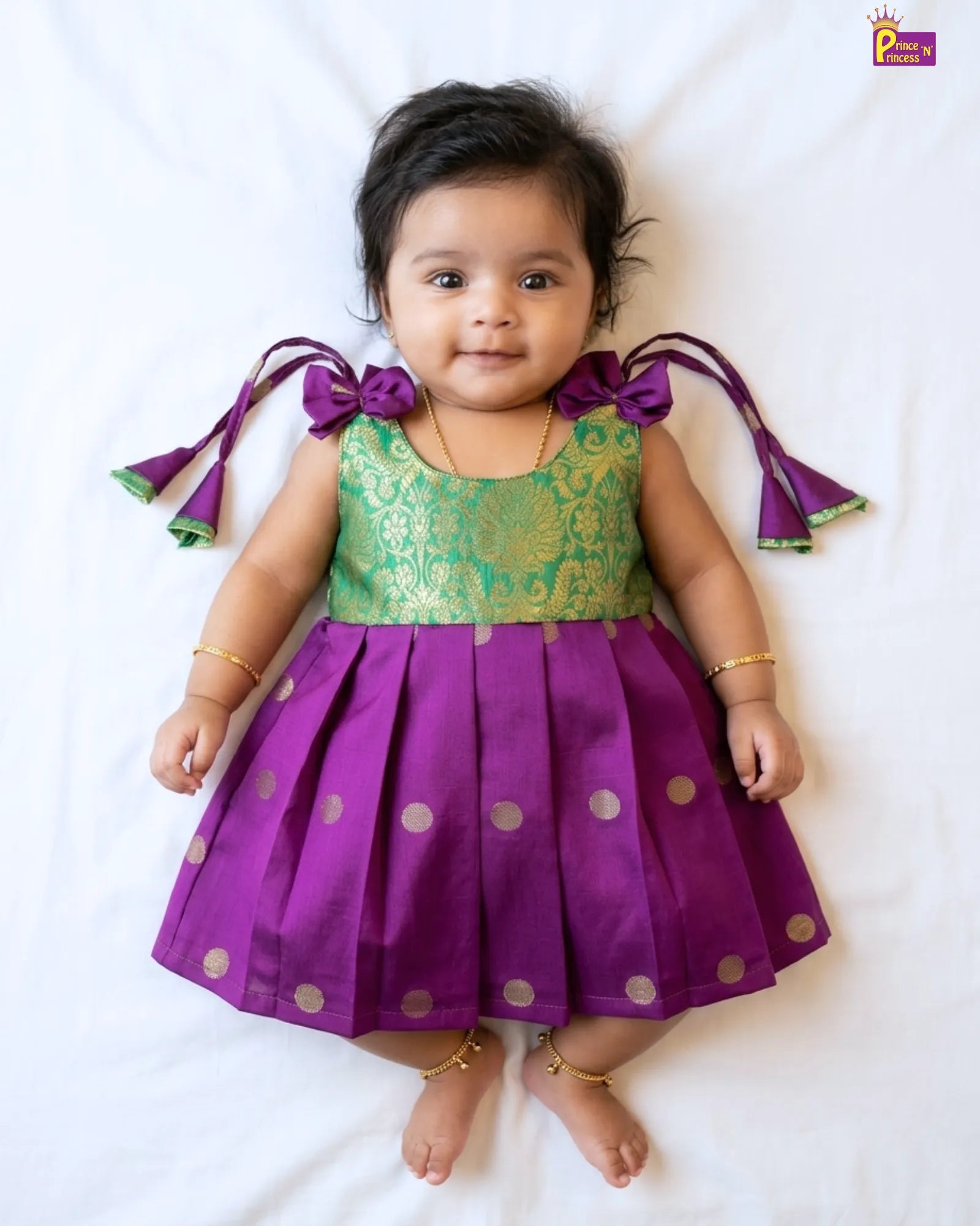 newborn silk purple with green pattu frock with cute smile 