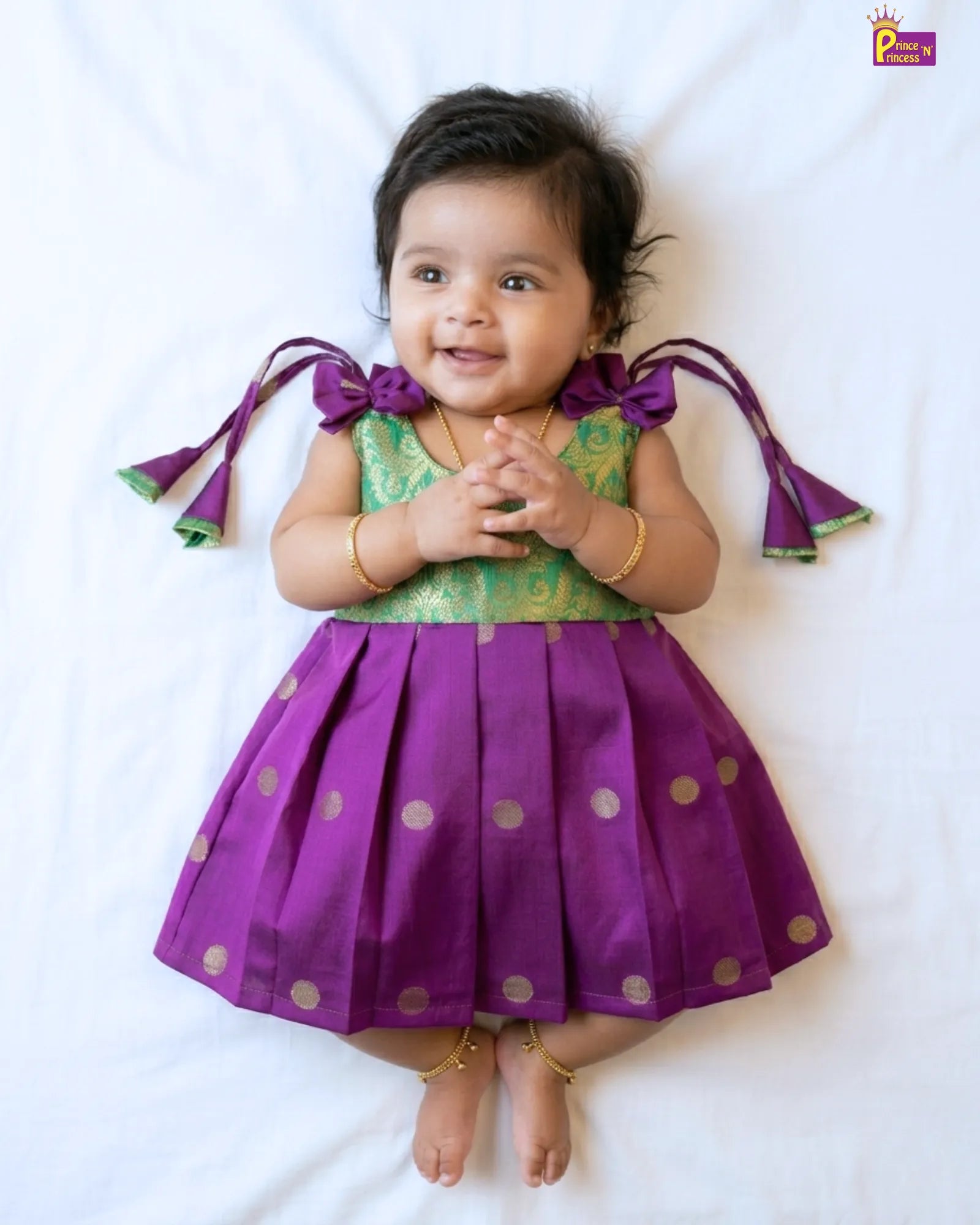 cute baby is wearing purple pattu frock newborn collection of princenprincess