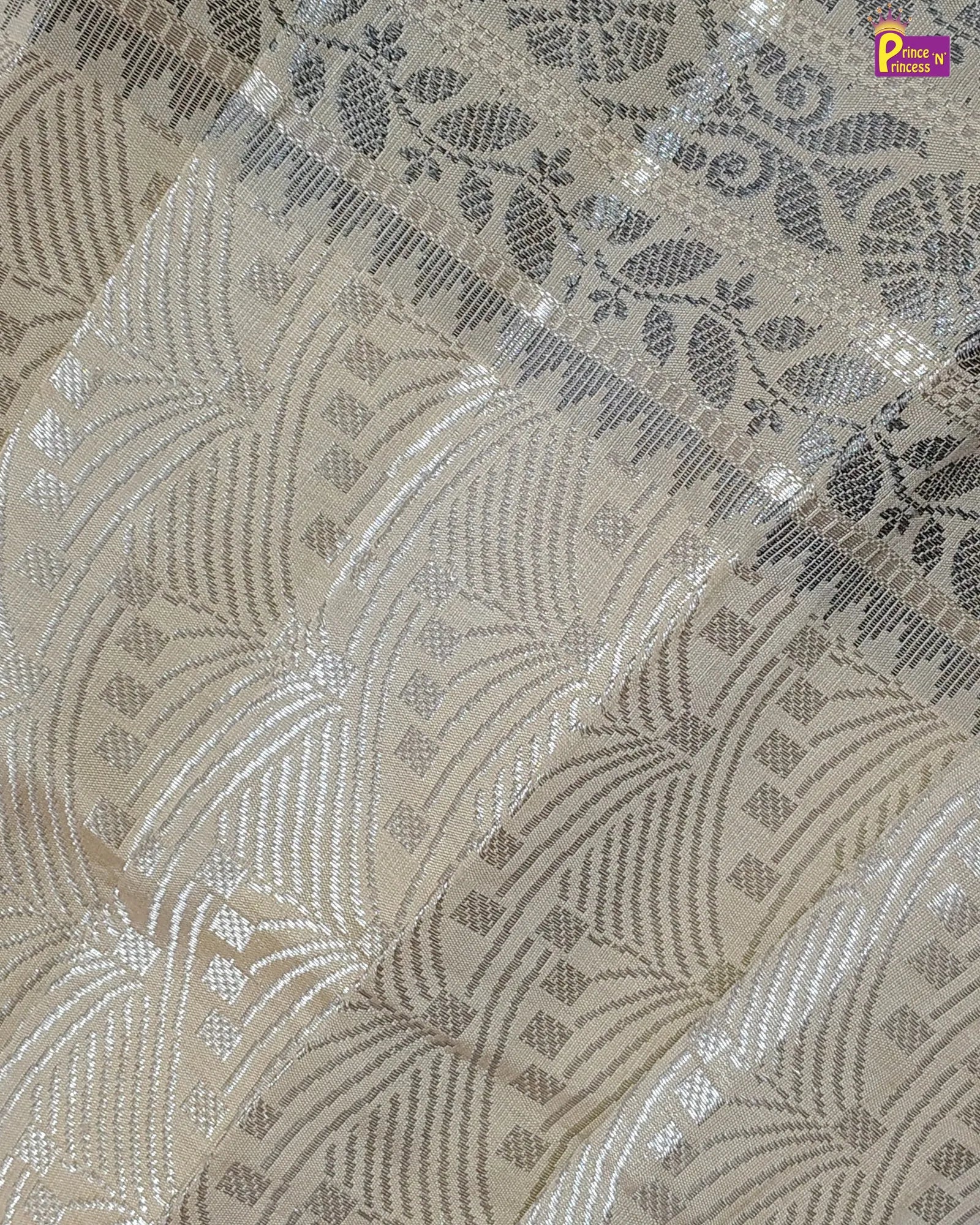 Decorative fabric with intricate patterns and textures on a beige background