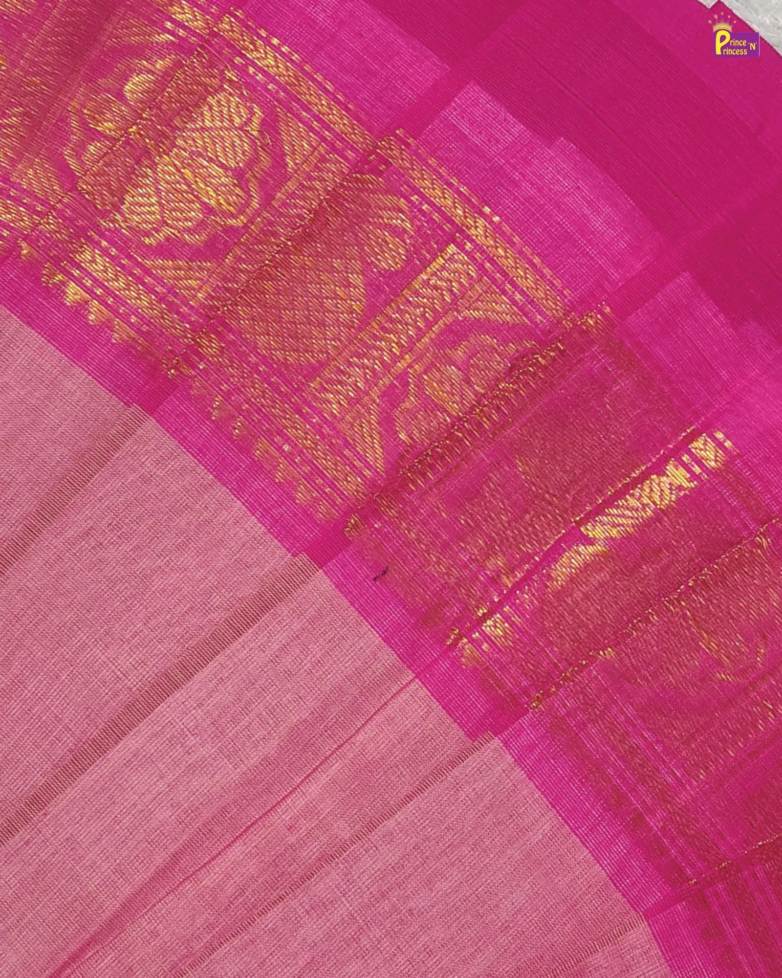 Pink fabric with gold embroidery and pattern
