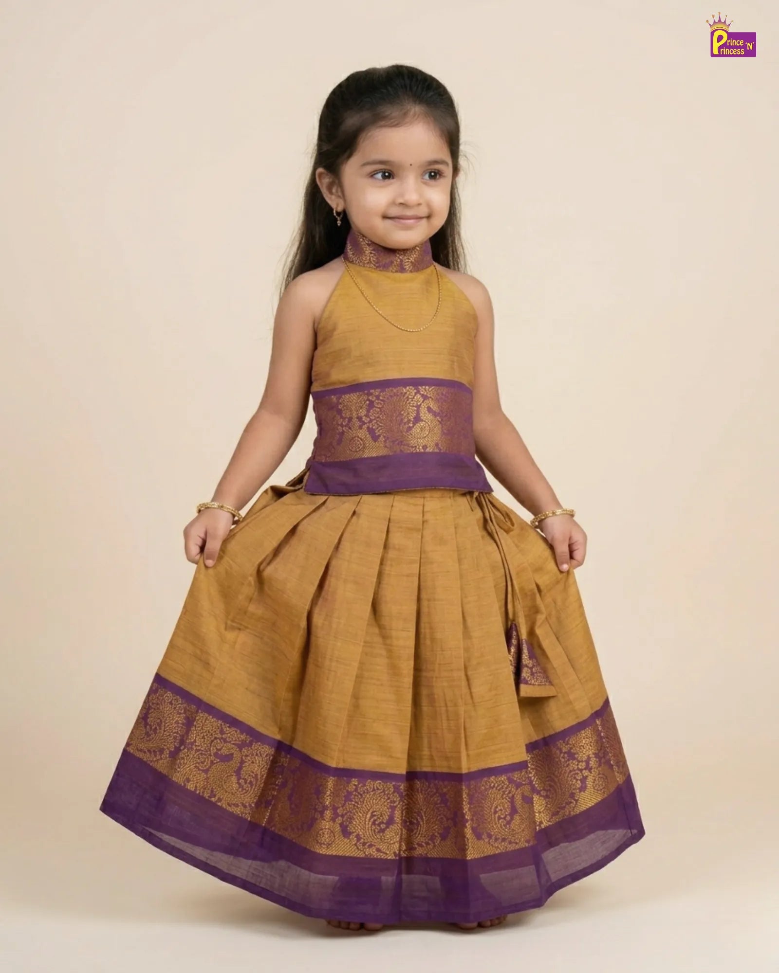 Decorative dress with intricate patterns on a beige background