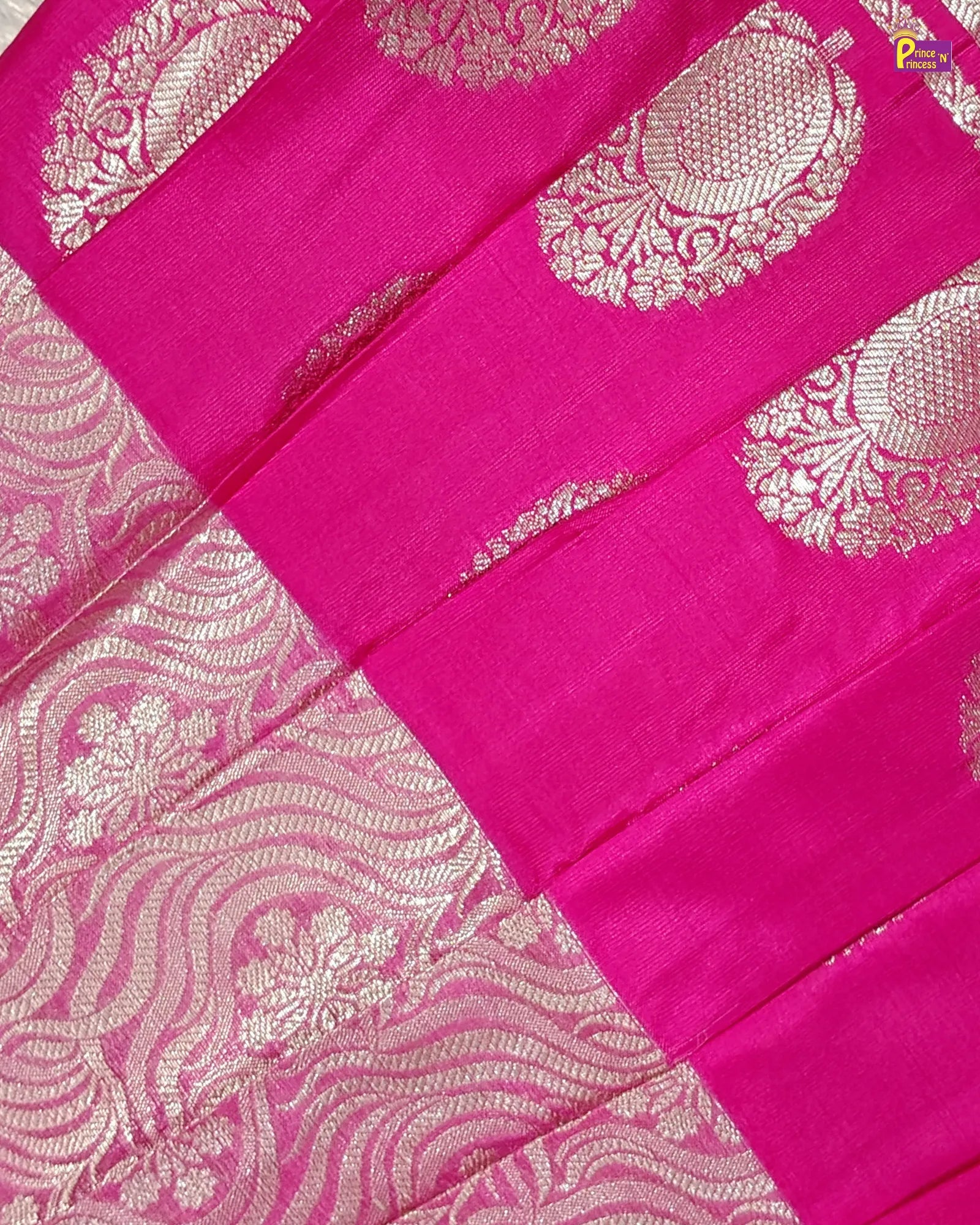 Pink saree with white floral patterns