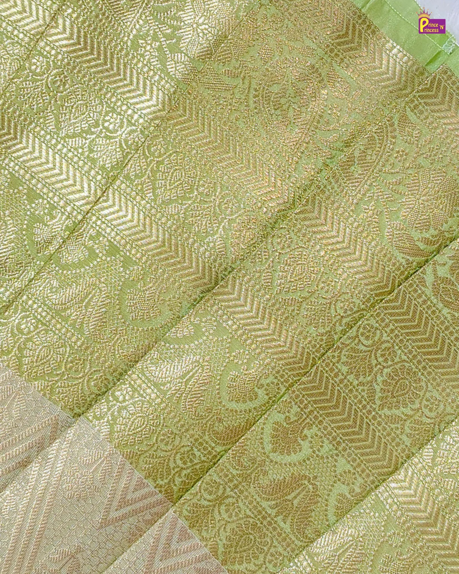 Patterned fabric with a green and beige color scheme