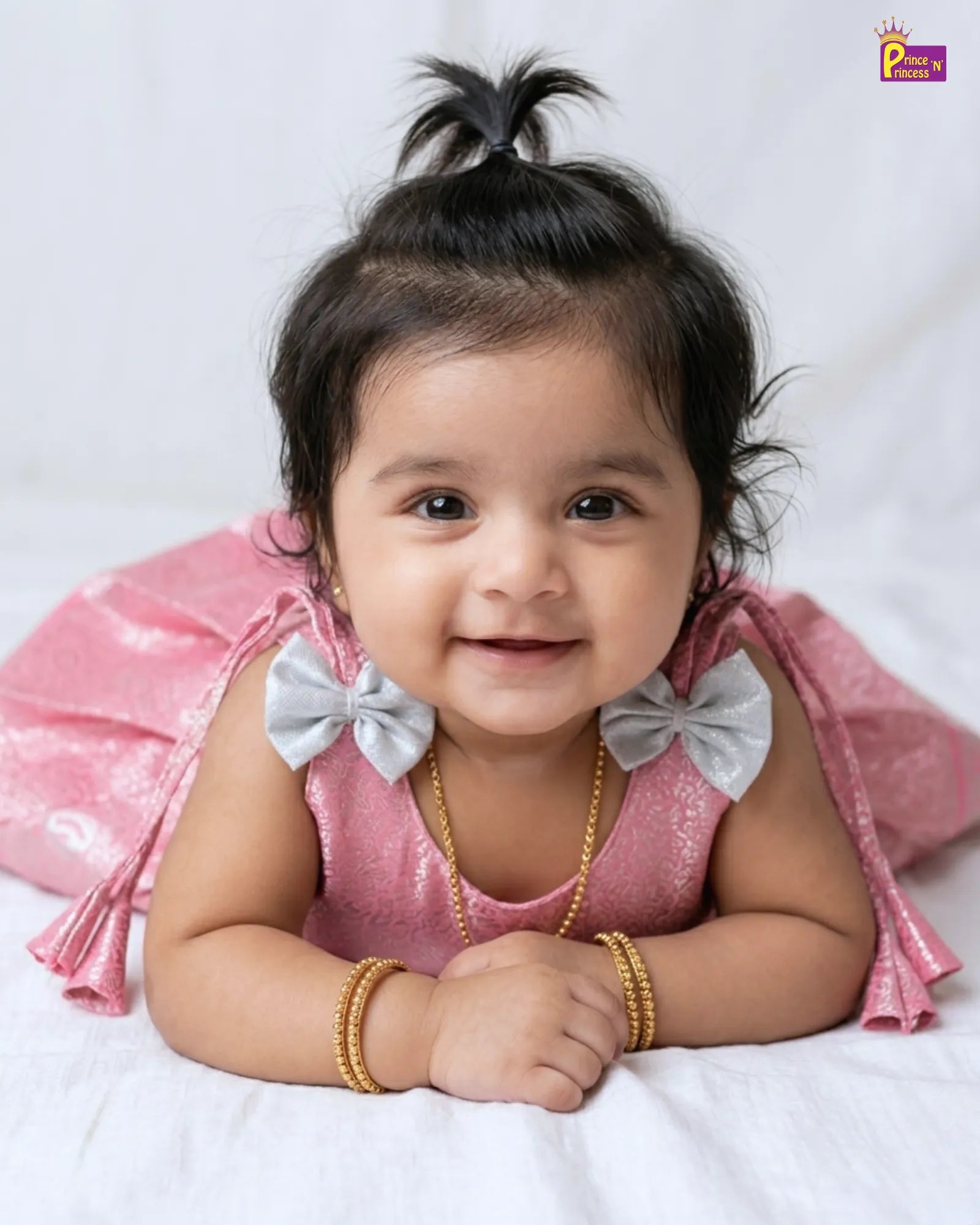 cute newborn pose with princenprincess pattu frock