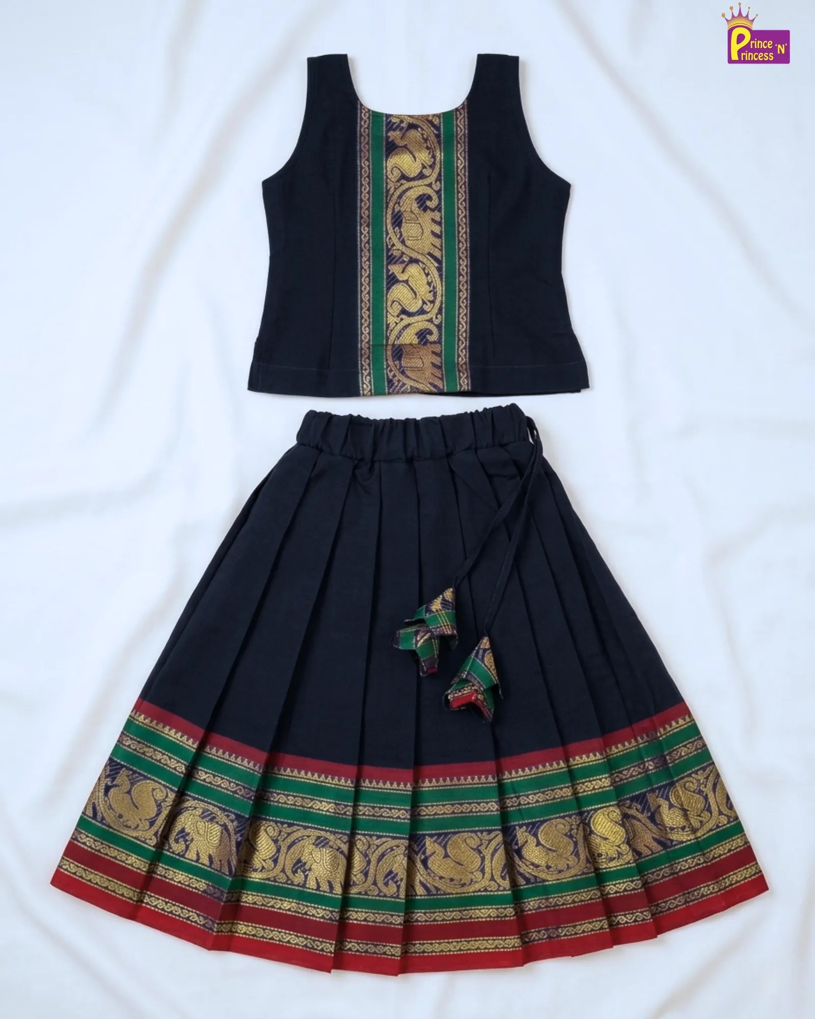 Black sleeveless top and skirt set with decorative patterns on a white background