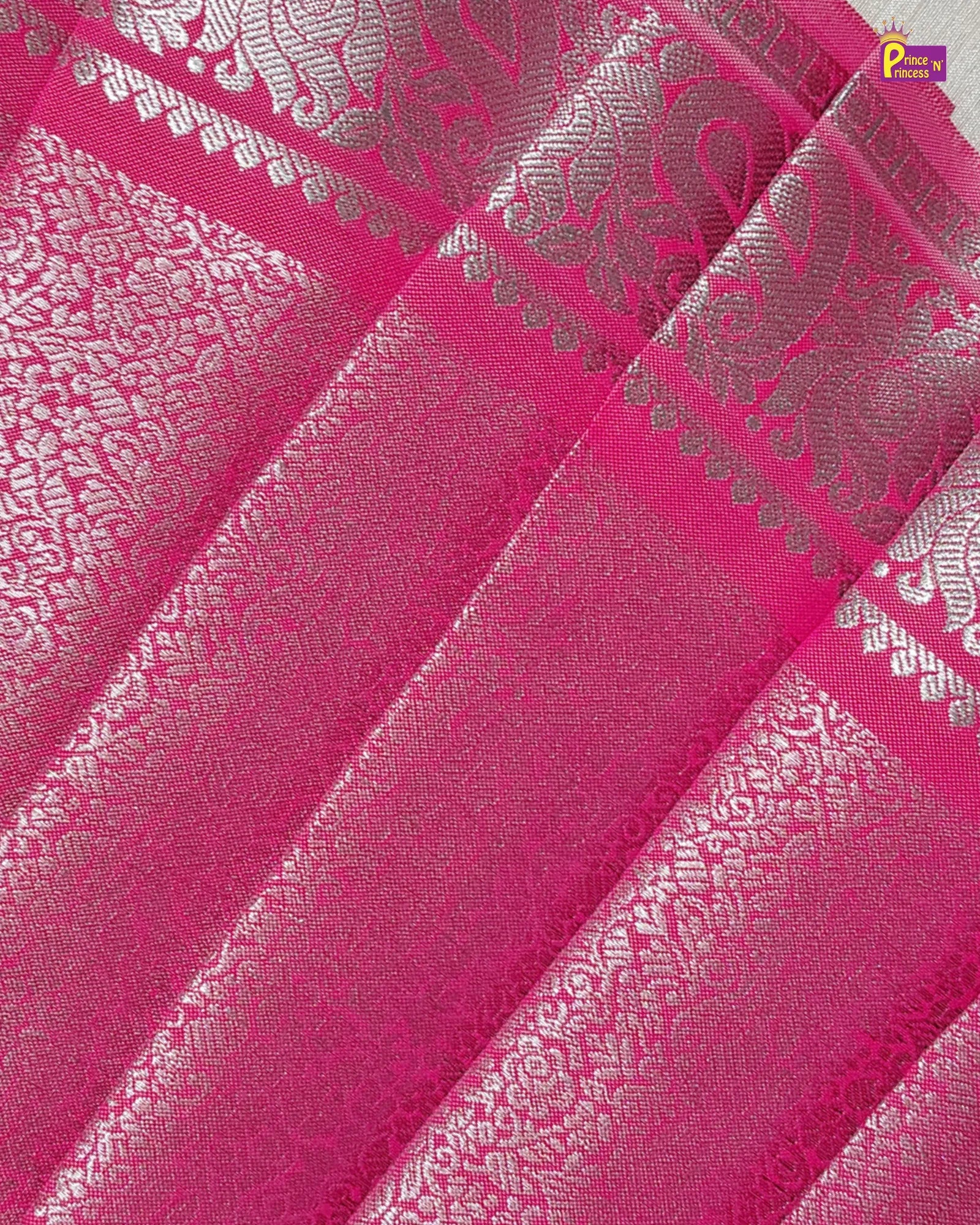 Pink fabric with silver intricate patterns