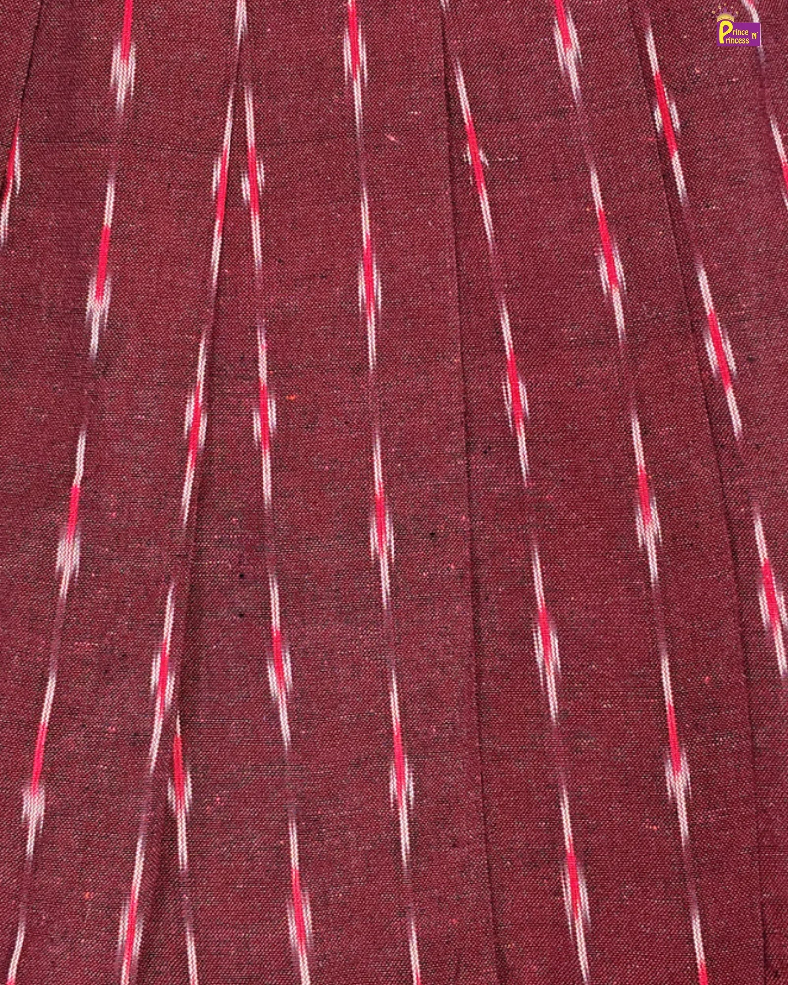 Close-up of maroon fabric with red and white diagonal stripes
