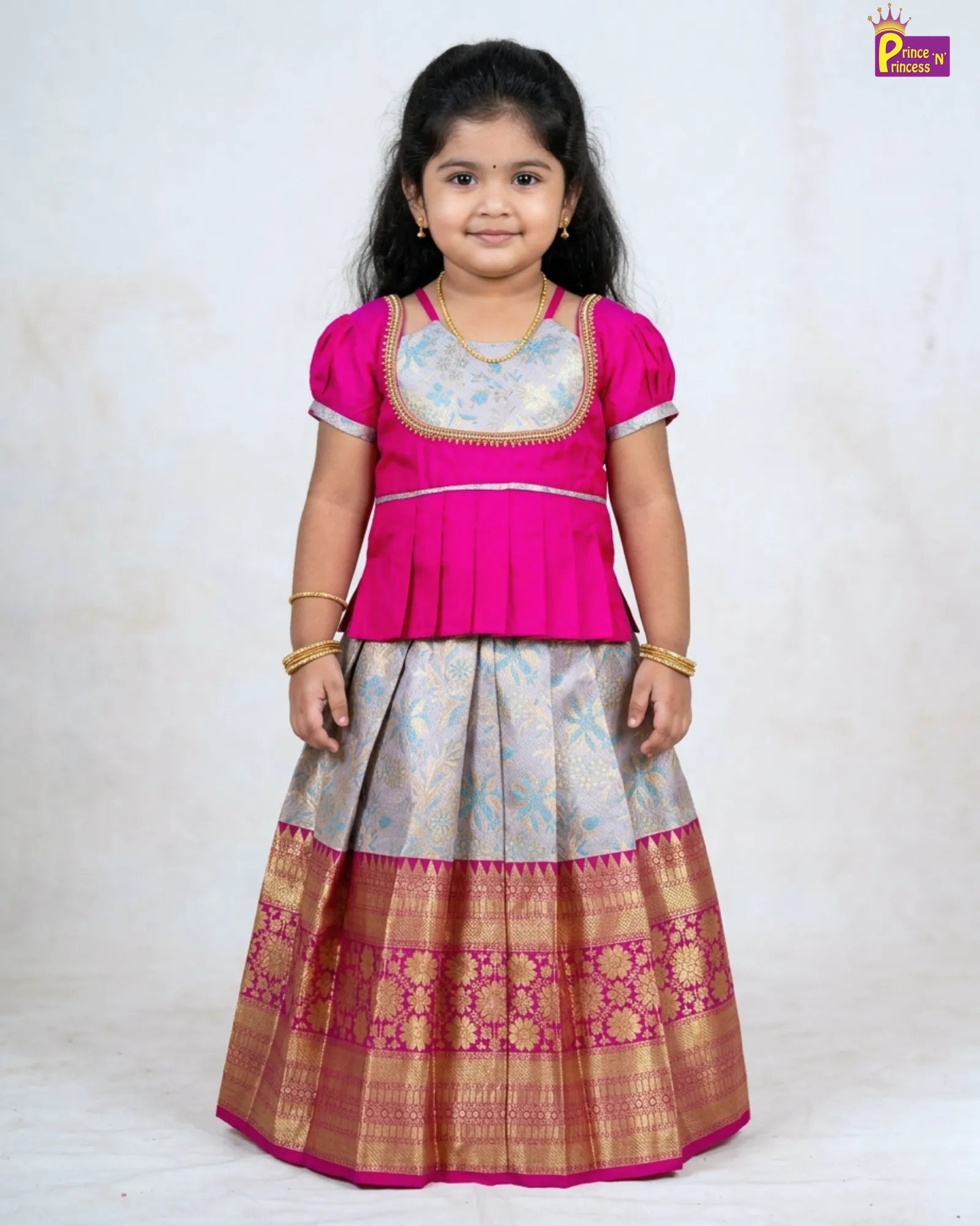 pink pattu pavadai with grand handmade aari work 
