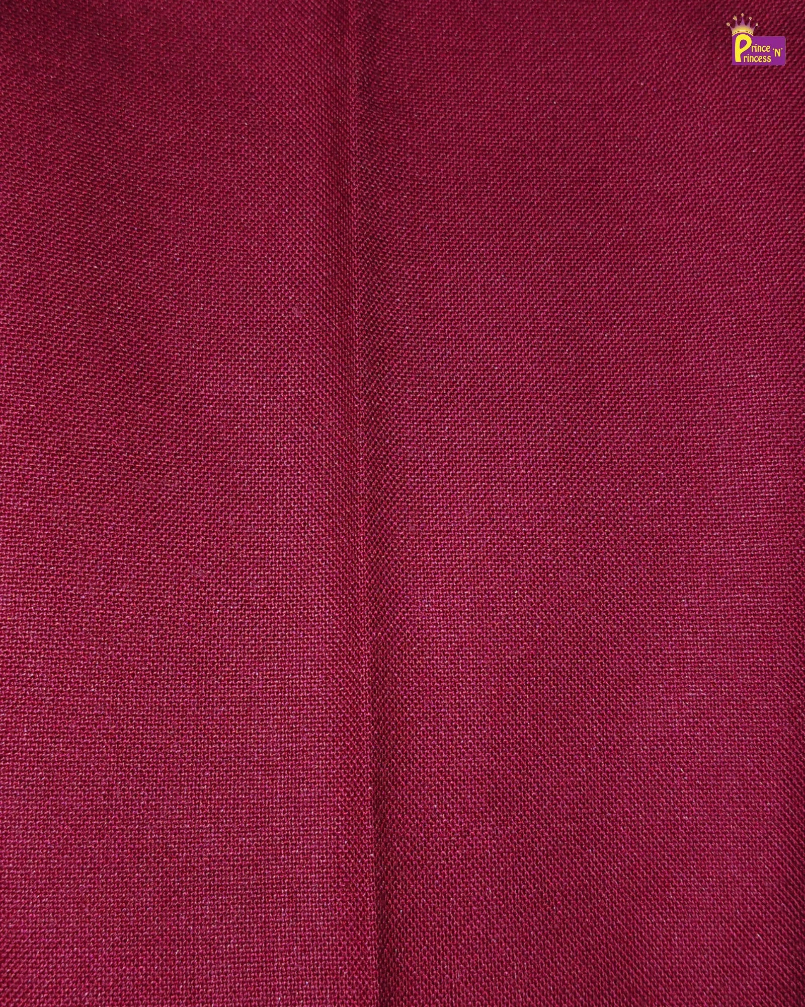Close-up of maroon fabric with a subtle texture