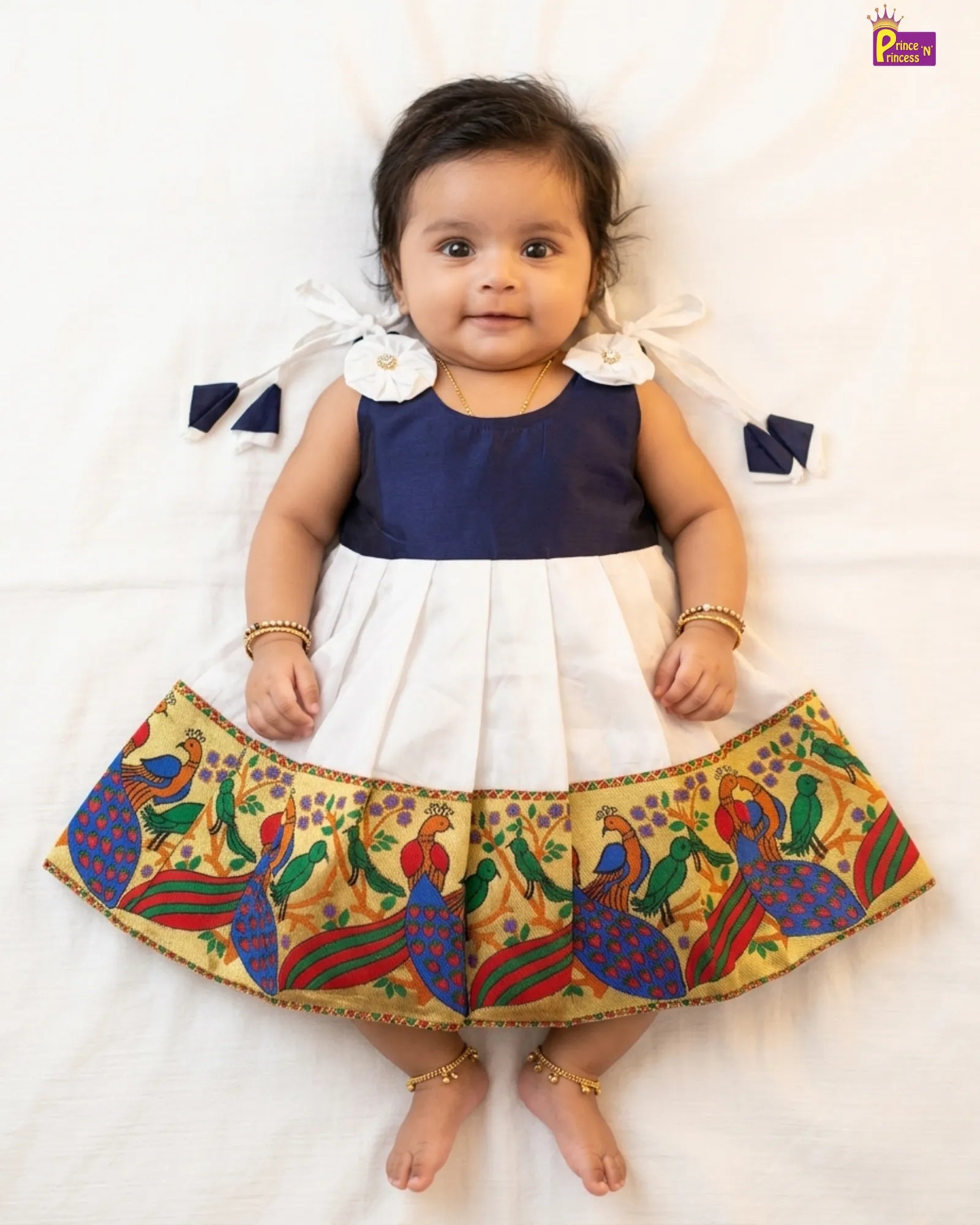 white pattu frock with peacock border top navy blue with bow
