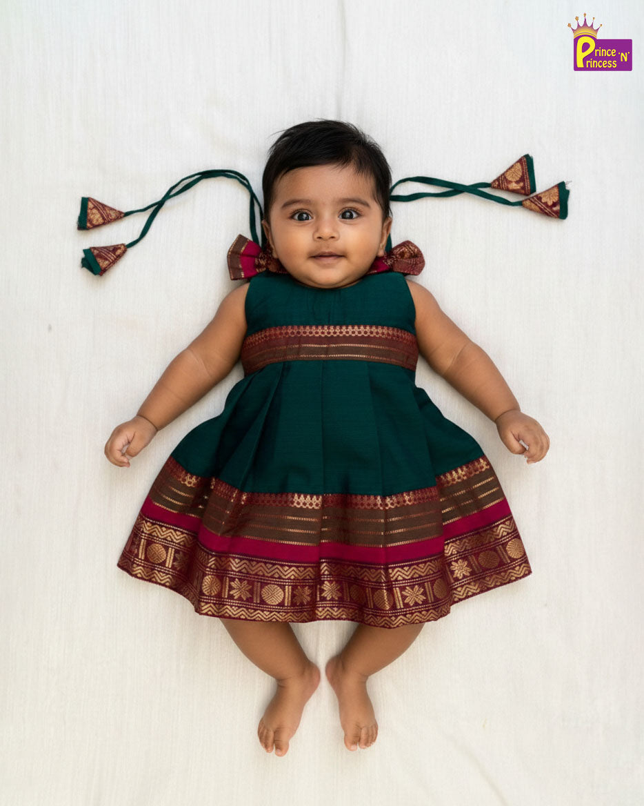 Baby wearing a traditional outfit with decorative elements on a white background - Prince N Princess