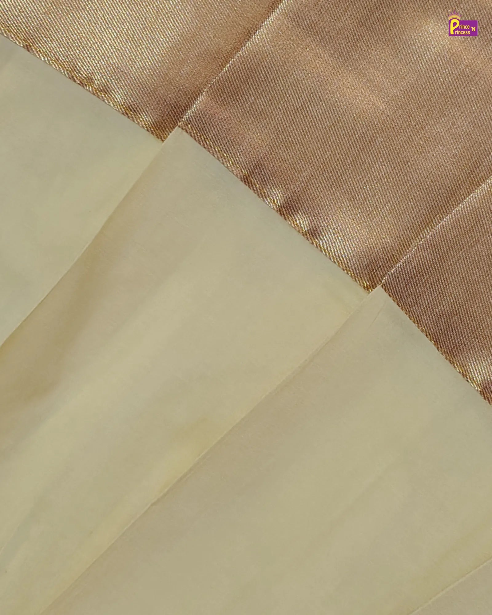 Close-up of beige fabric with a textured brown pattern