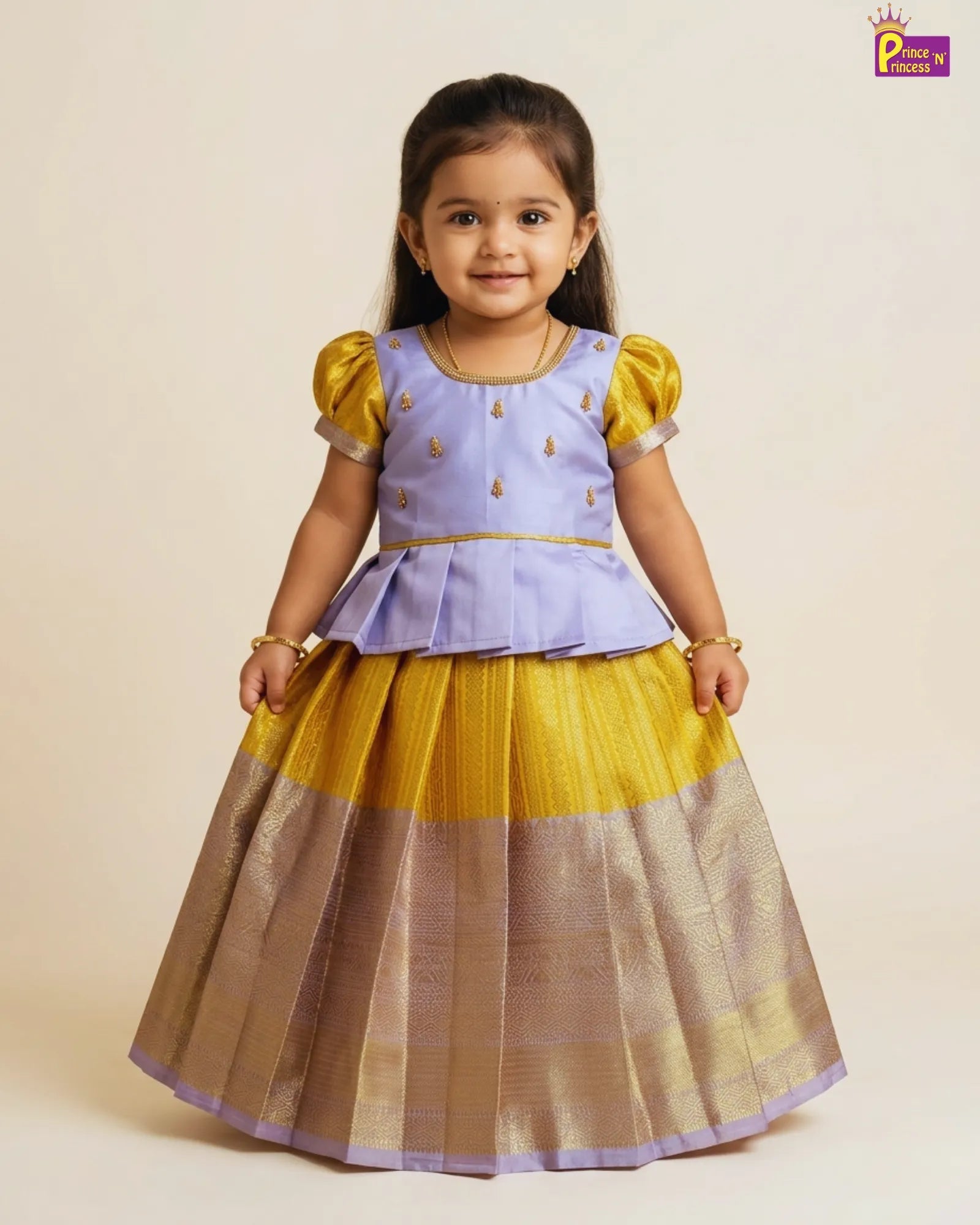 Young girl wearing a traditional outfit with a blue top and yellow skirt on a beige background