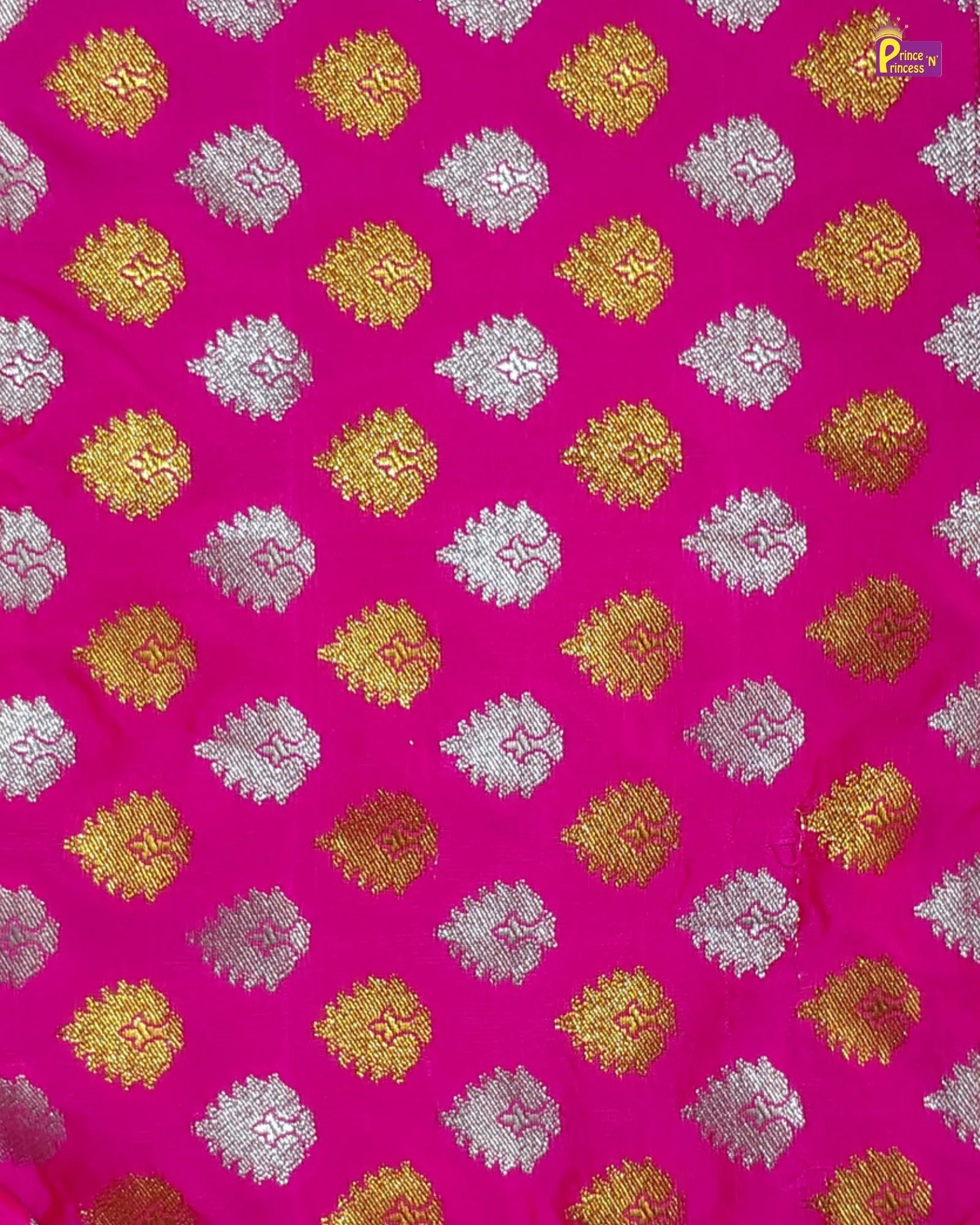 Patterned fabric with yellow and white floral designs on a pink background