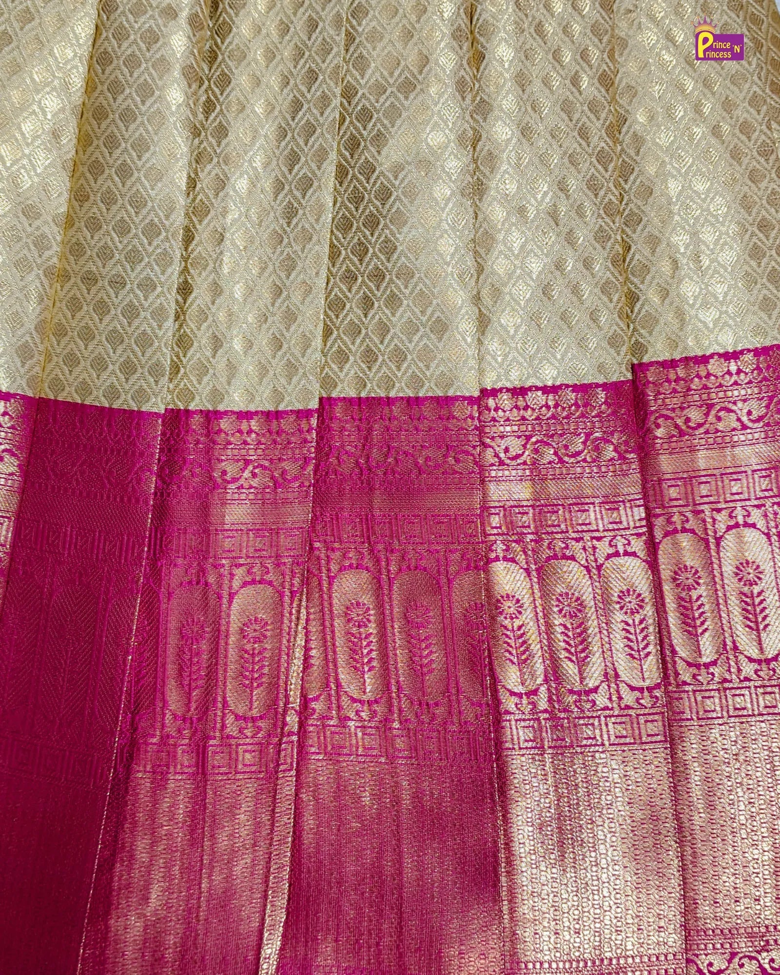 Saree with a pink and white patterned design