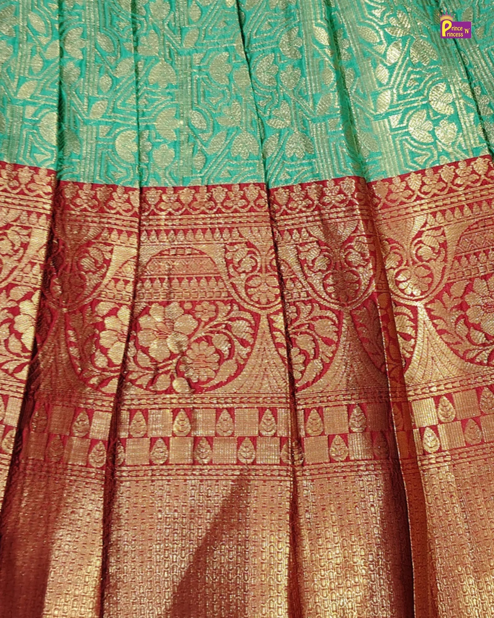 Traditional saree with green and red patterns