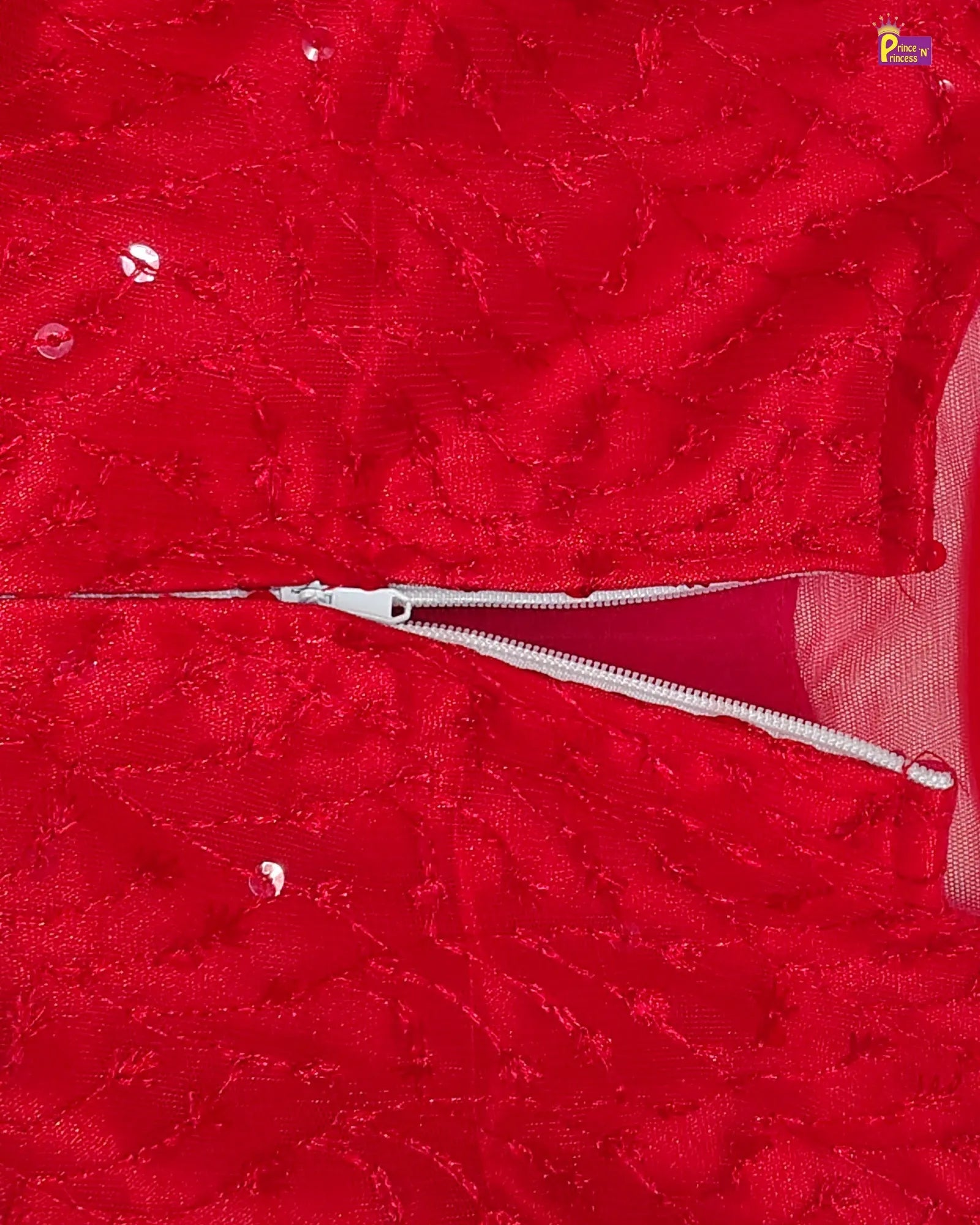 Red textured fabric with a zipper in the center