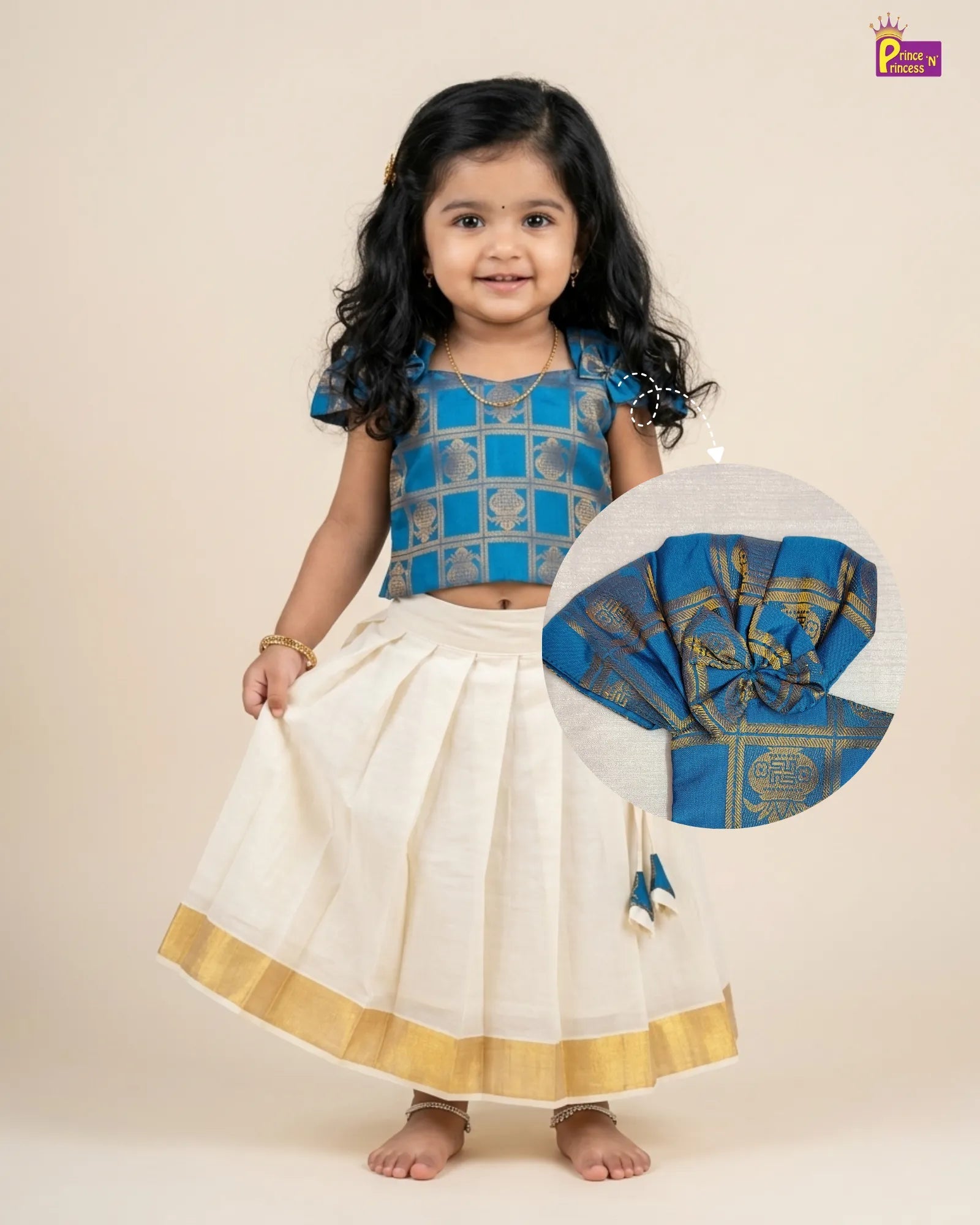 Young girl in traditional blue and white outfit with a decorative piece on beige background