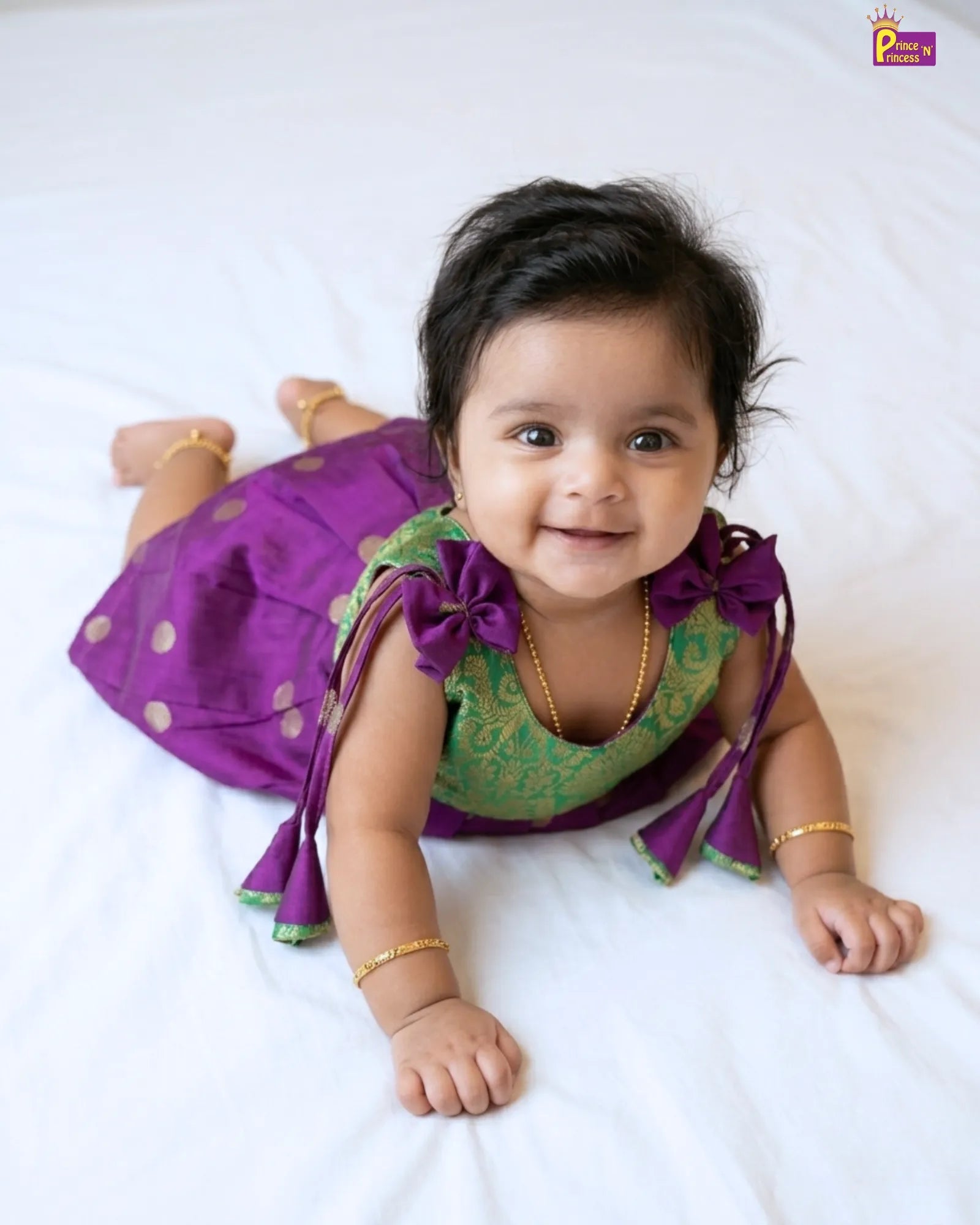 crawling girl with comfortable pattu frock