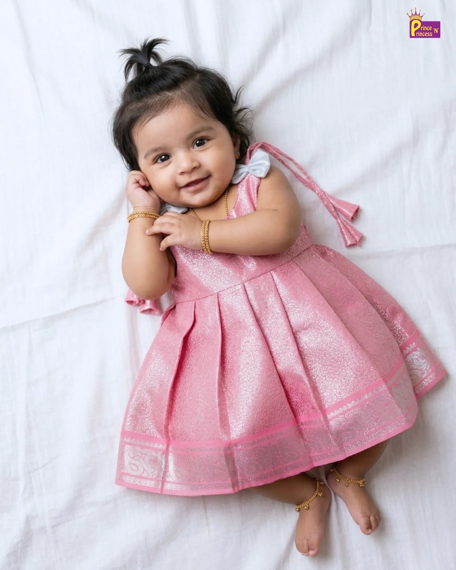 newborn photograph with baby pink pattu frock 