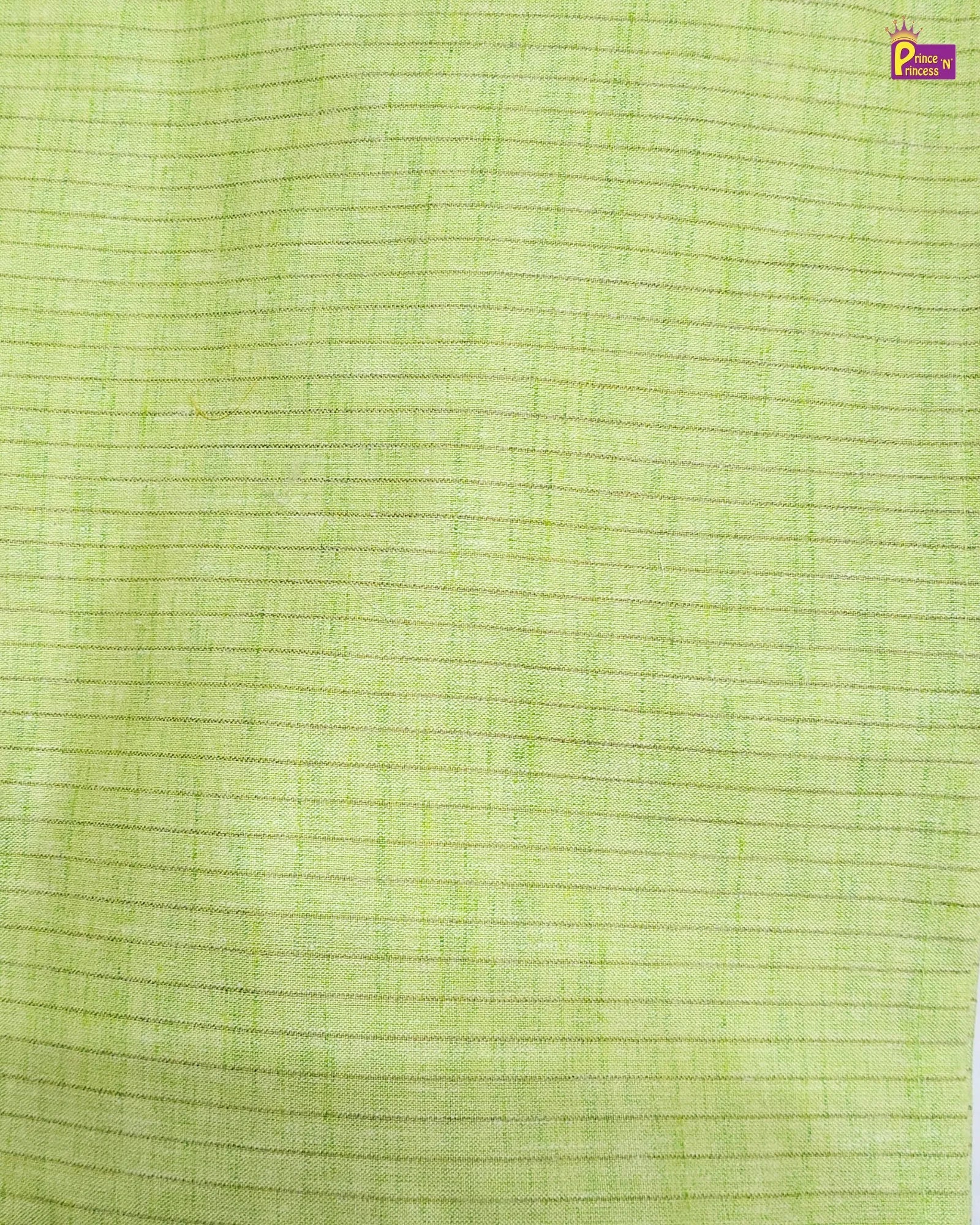 Close-up of green fabric with a subtle pattern