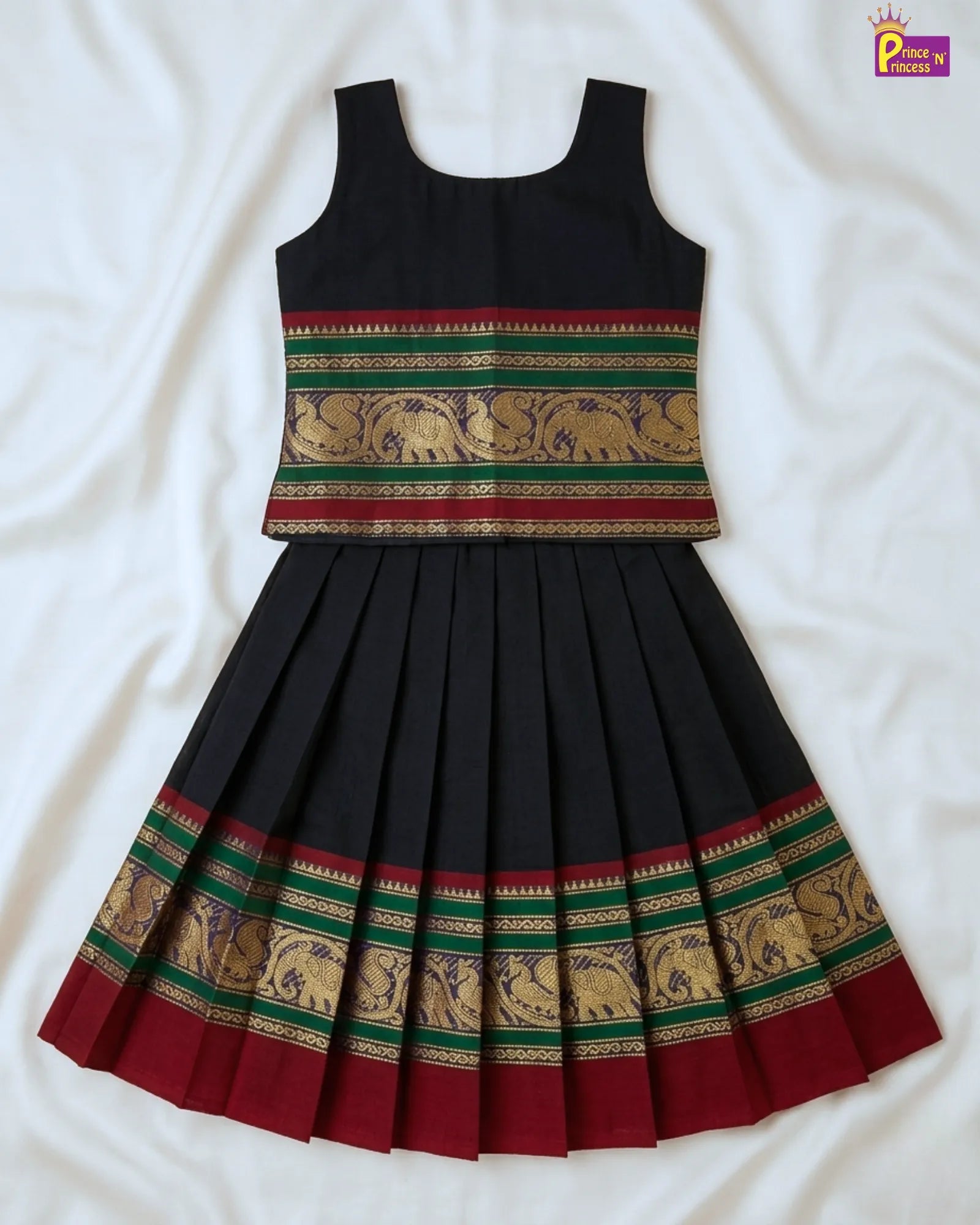 Black dress with colorful elephant pattern on a white background