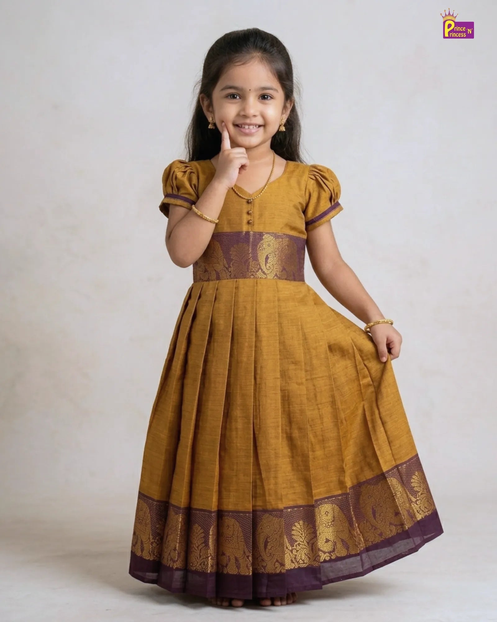Girls Chettinad Pattu Gown – Mustard Gold Cotton Floor-Length Dress with Purple Elephant Zari Border PG719 for kids festival wear