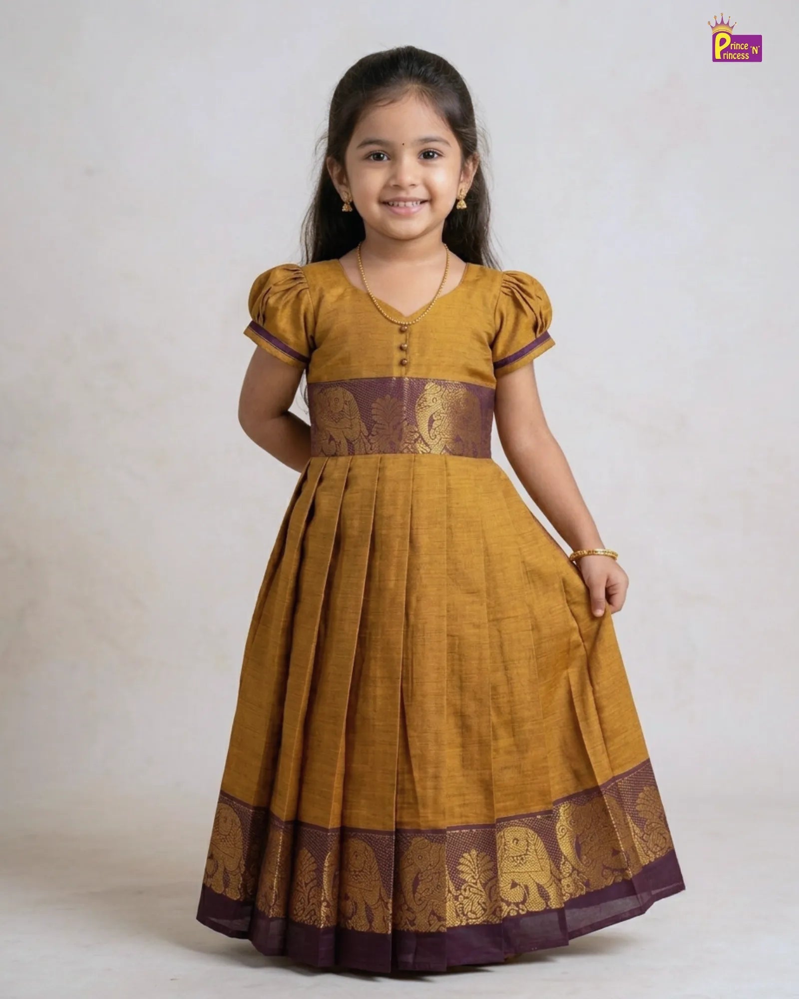 Girls Chettinad Pattu Gown – Mustard Gold Cotton Floor-Length Dress with Purple Elephant Zari Border PG719 for kids festival wear