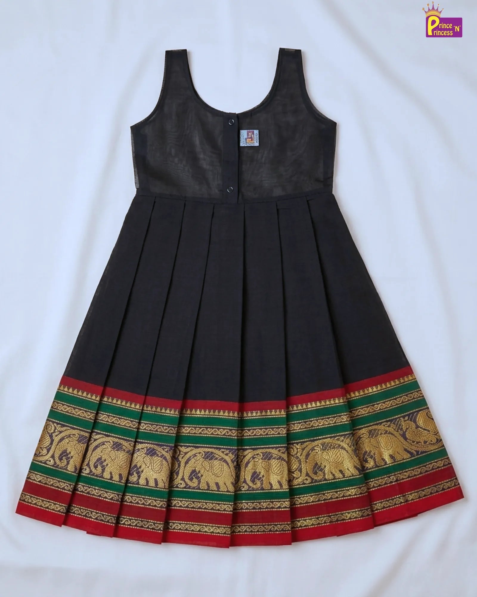 Black dress with elephant patterns on a white background