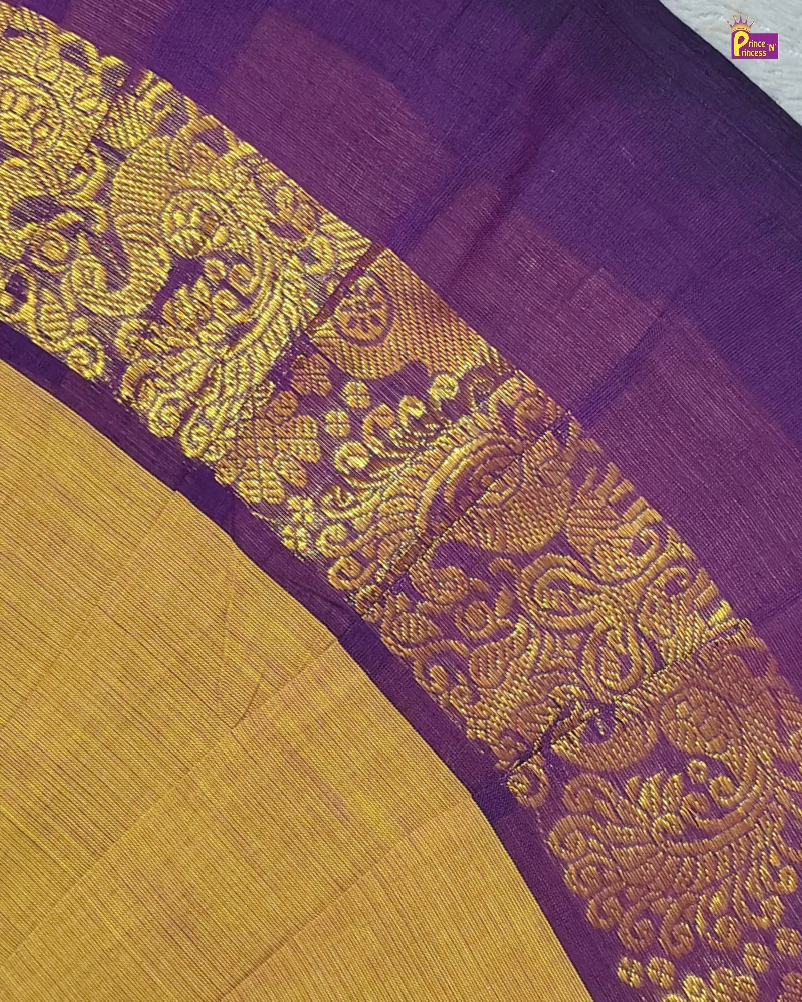 Purple and yellow fabric with intricate gold patterns
