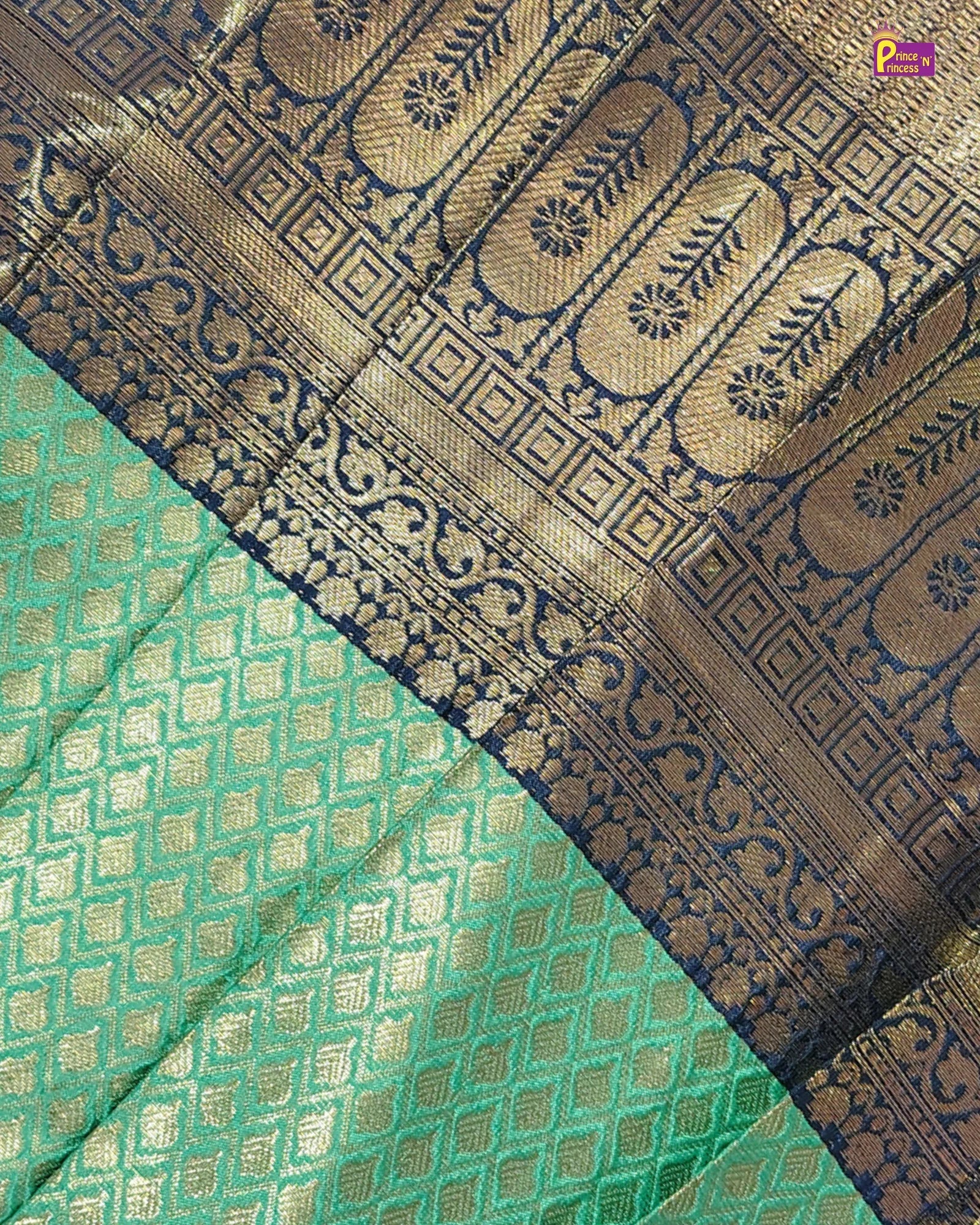 Decorative fabric with intricate patterns in green and brown