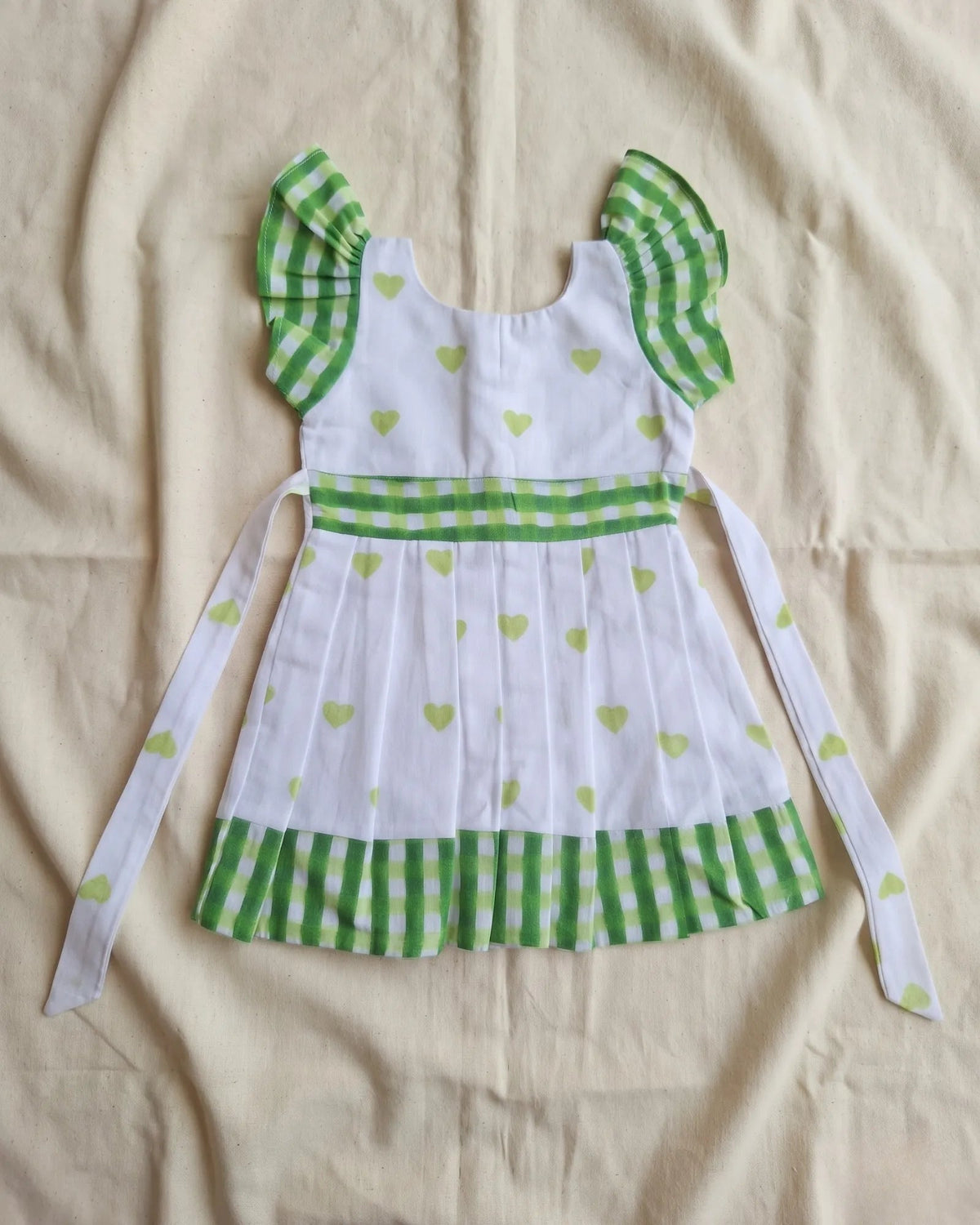 Girls White & Sage Green Heart Print Cotton Frock with Checked Ruffle Sleeves- CF454 for kids festival wear