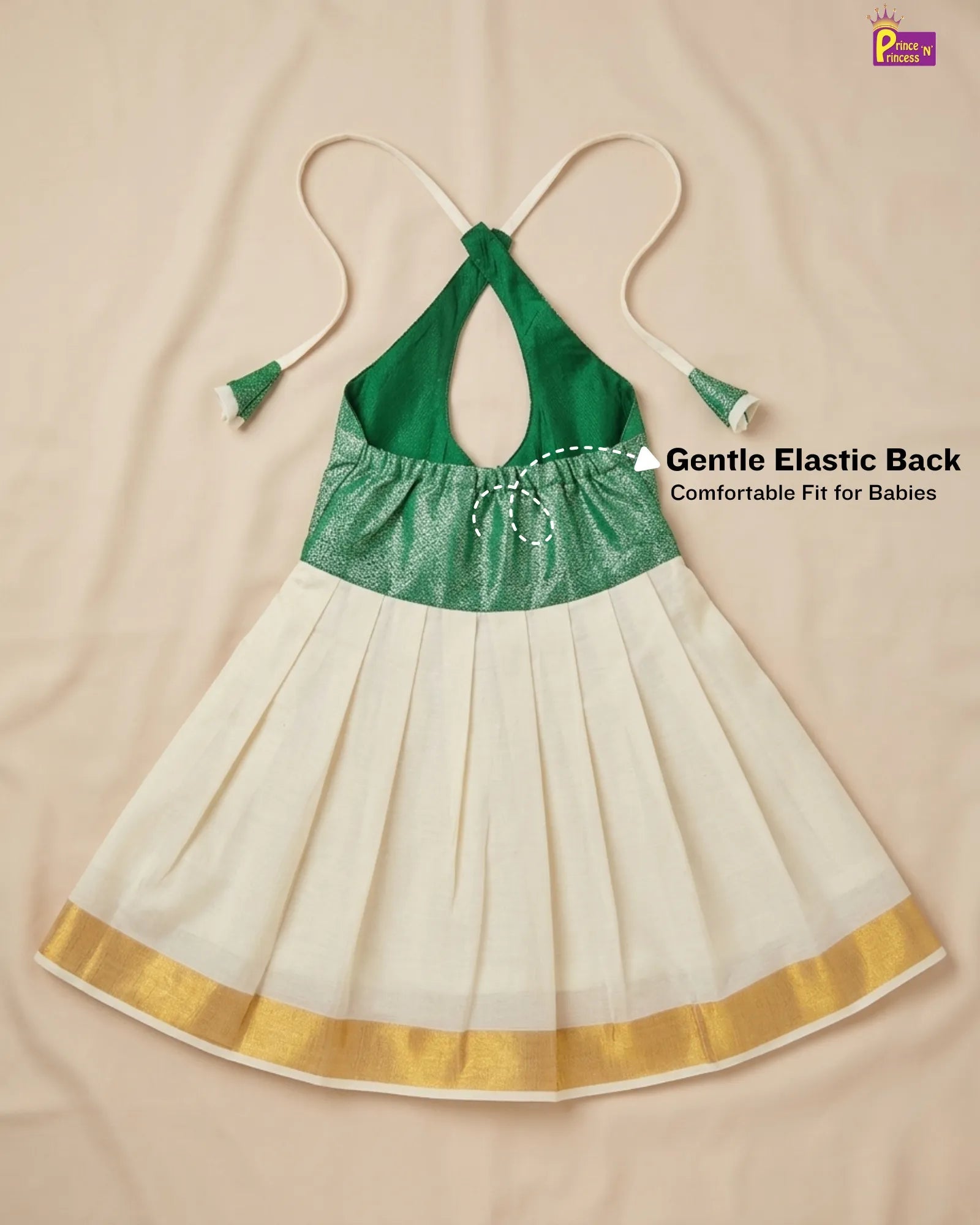 Green and white dress with gold trim on a beige background