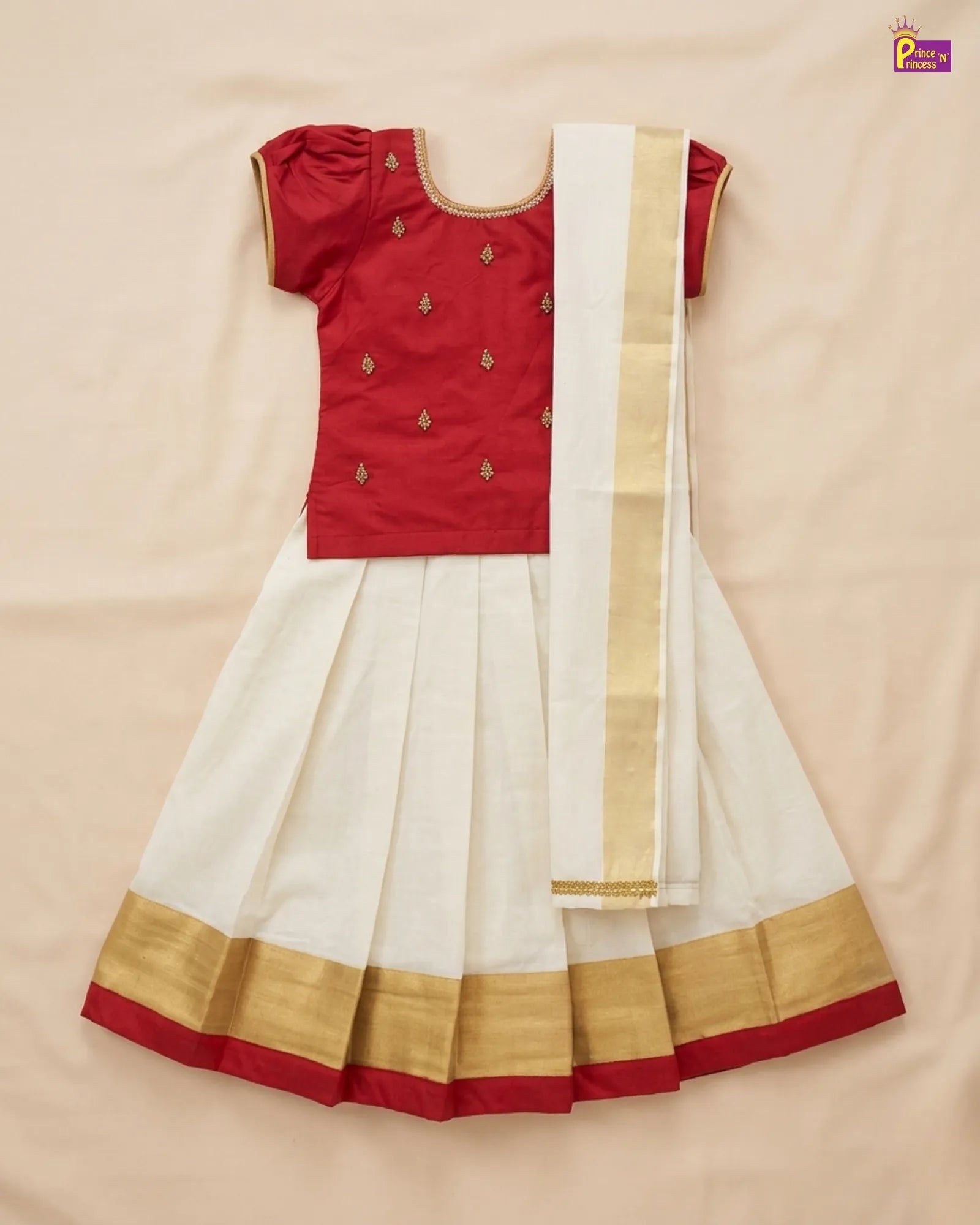Red and white traditional outfit with gold border on a beige background