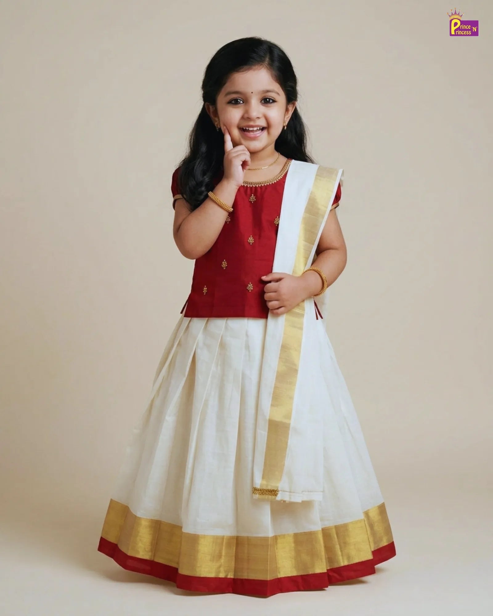 Young girl wearing a traditional outfit with a red blouse and white skirt on a beige background
