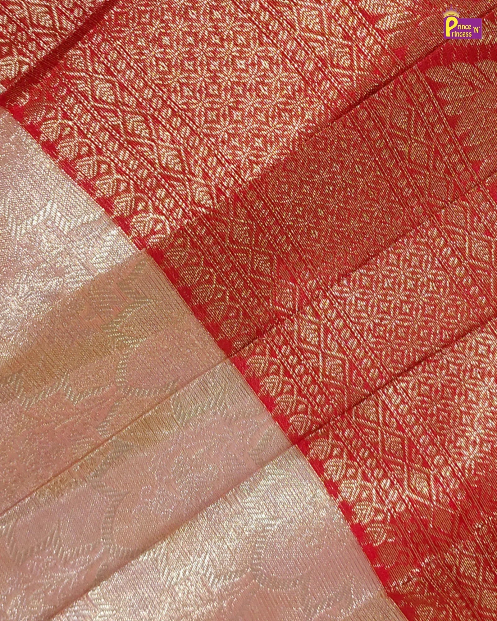 Close-up of red and gold patterned fabric