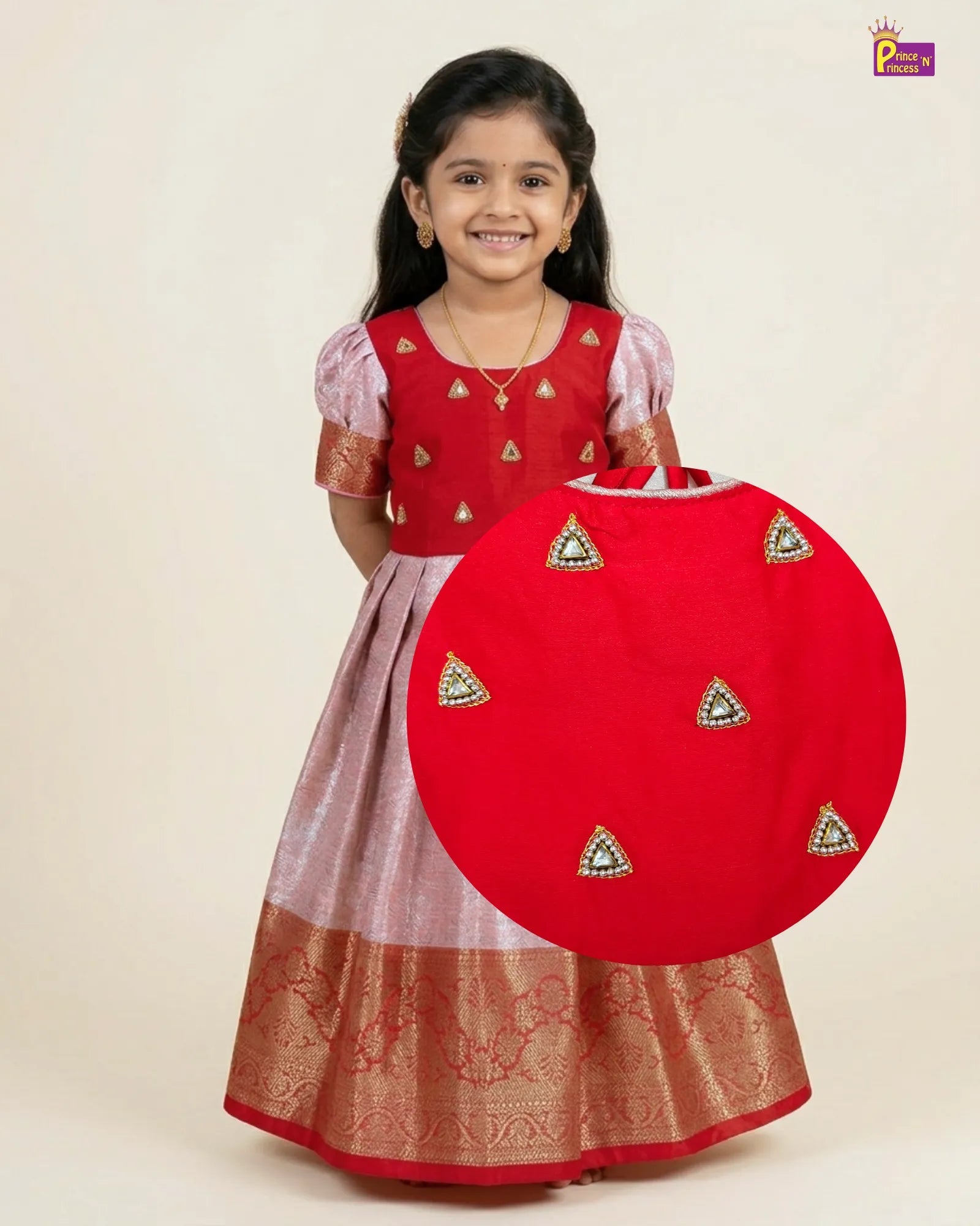 Young girl in a red and gold traditional outfit holding a matching red bag on a beige background