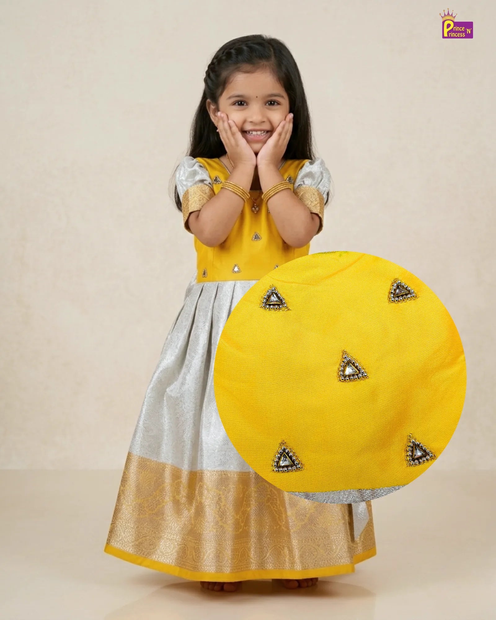 Young girl in a yellow and white traditional outfit with a matching yellow bag on a beige background
