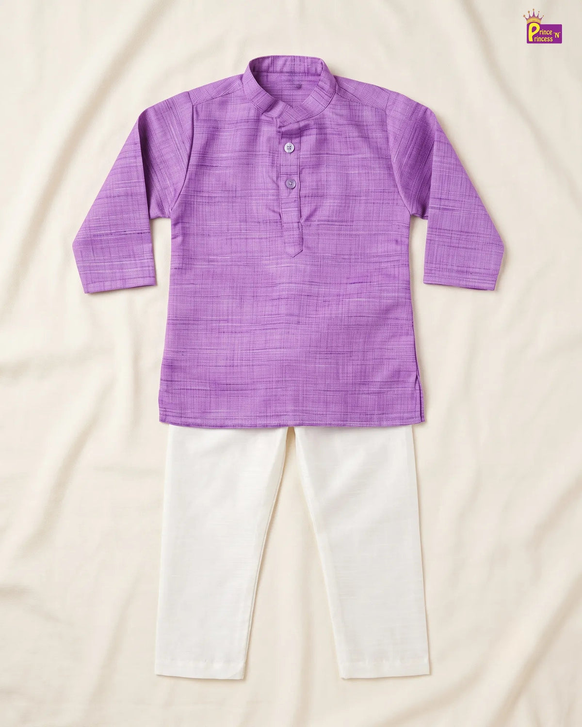 A children's traditional outfit set featuring a purple textured long-sleeve kurta with a mandarin collar and white pants, laid flat on a cream-colored fabric background.