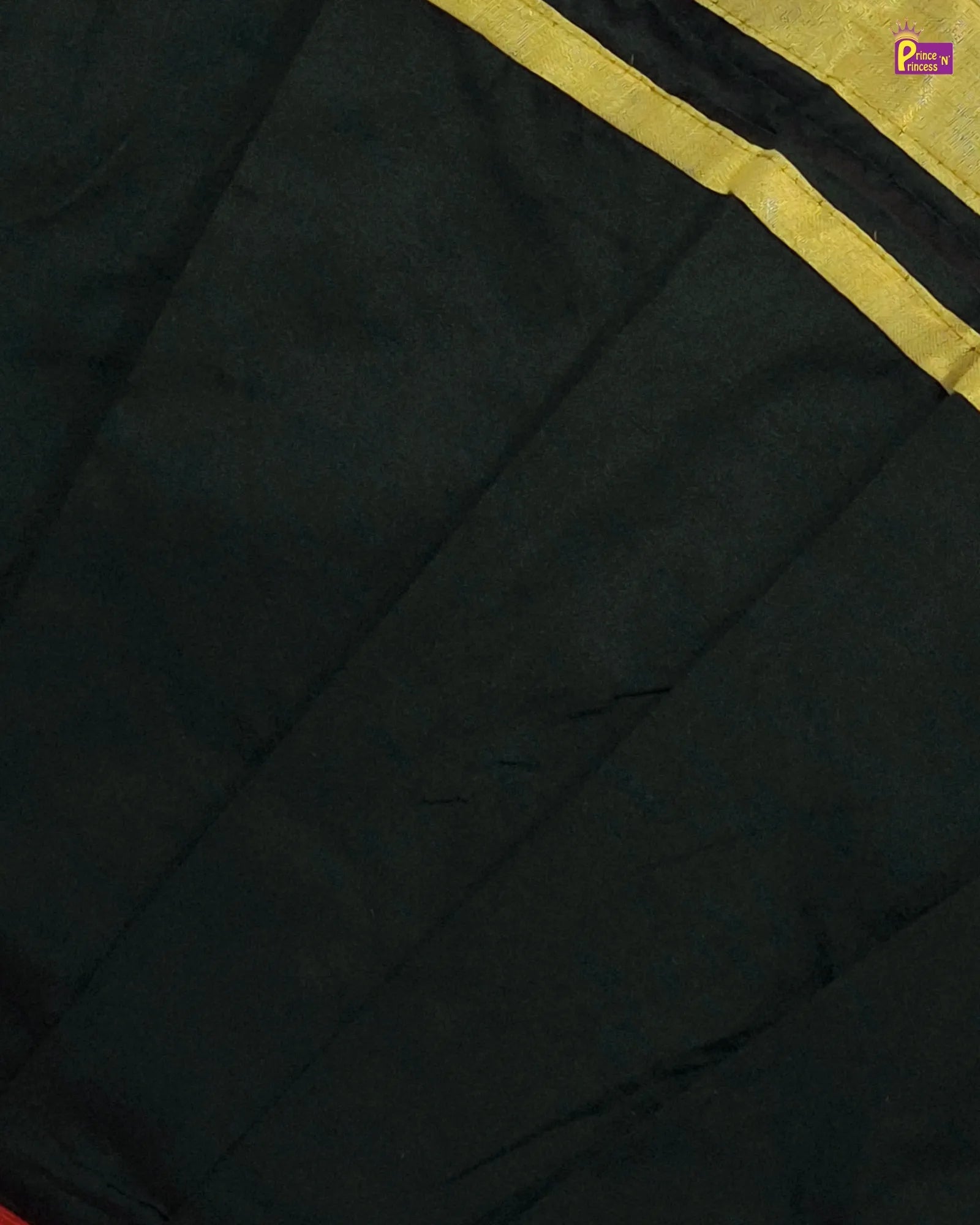 Black fabric with yellow trim on a dark background