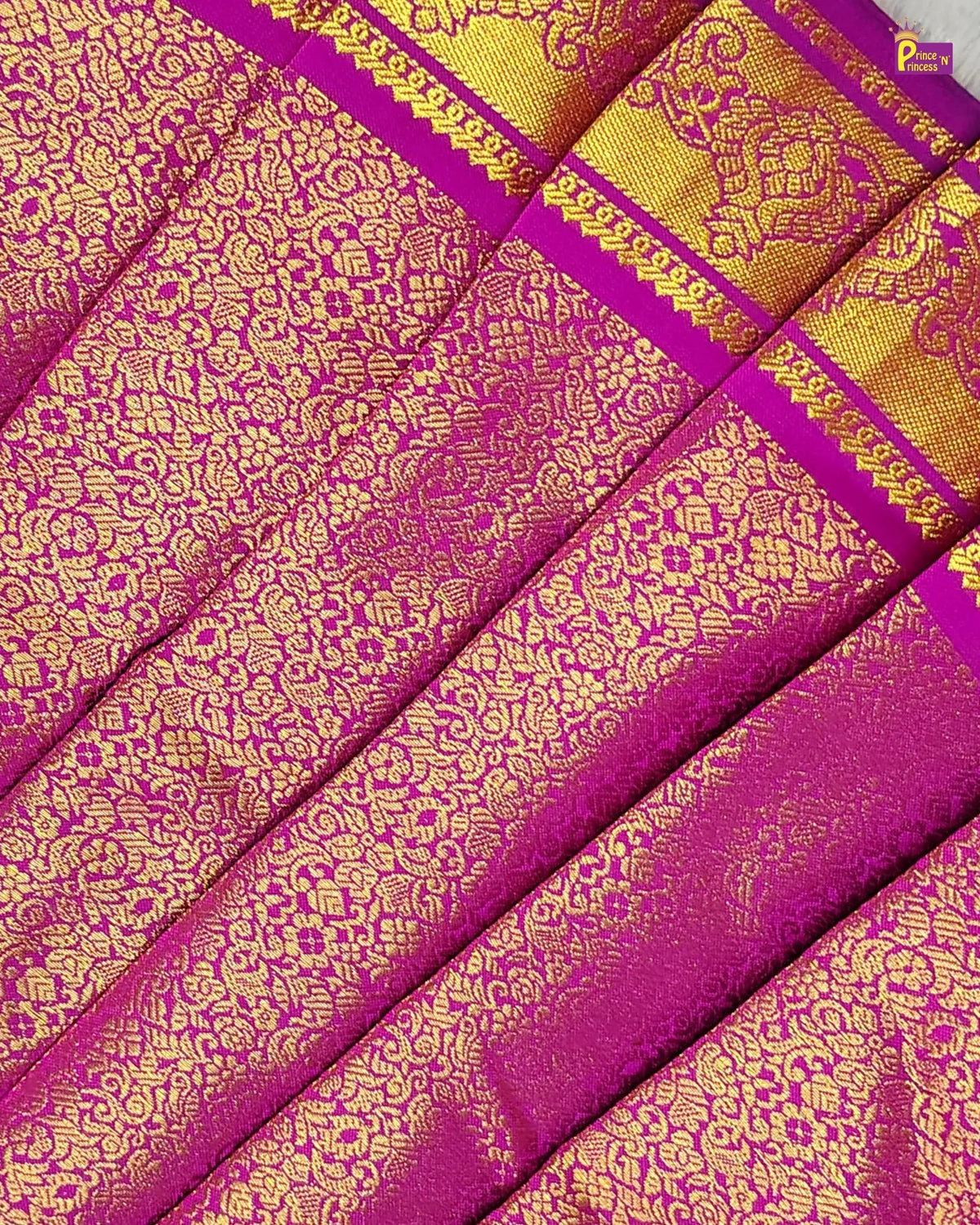 Purple and gold patterned fabric with a brand logo in the corner