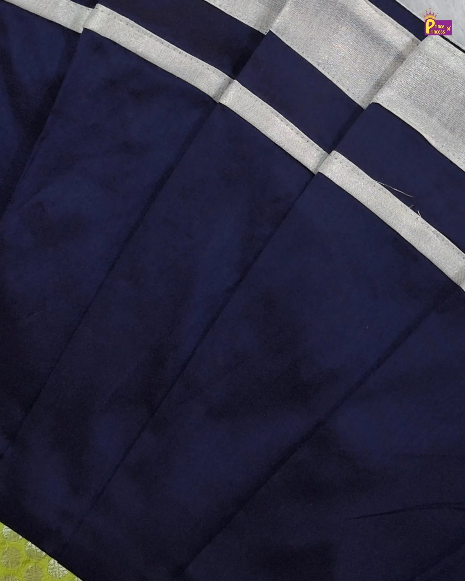 Navy blue fabric with a white border