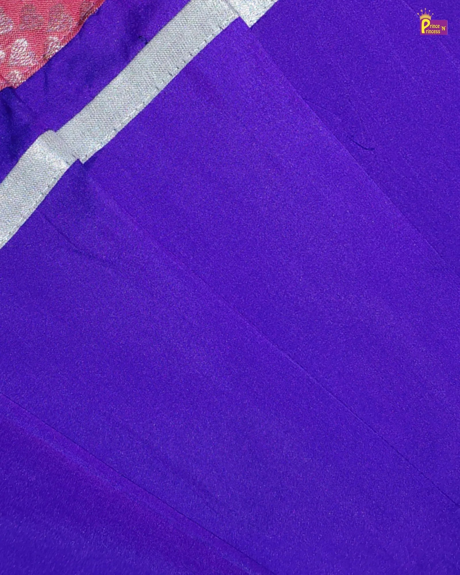 Close-up of a purple fabric with a silver border