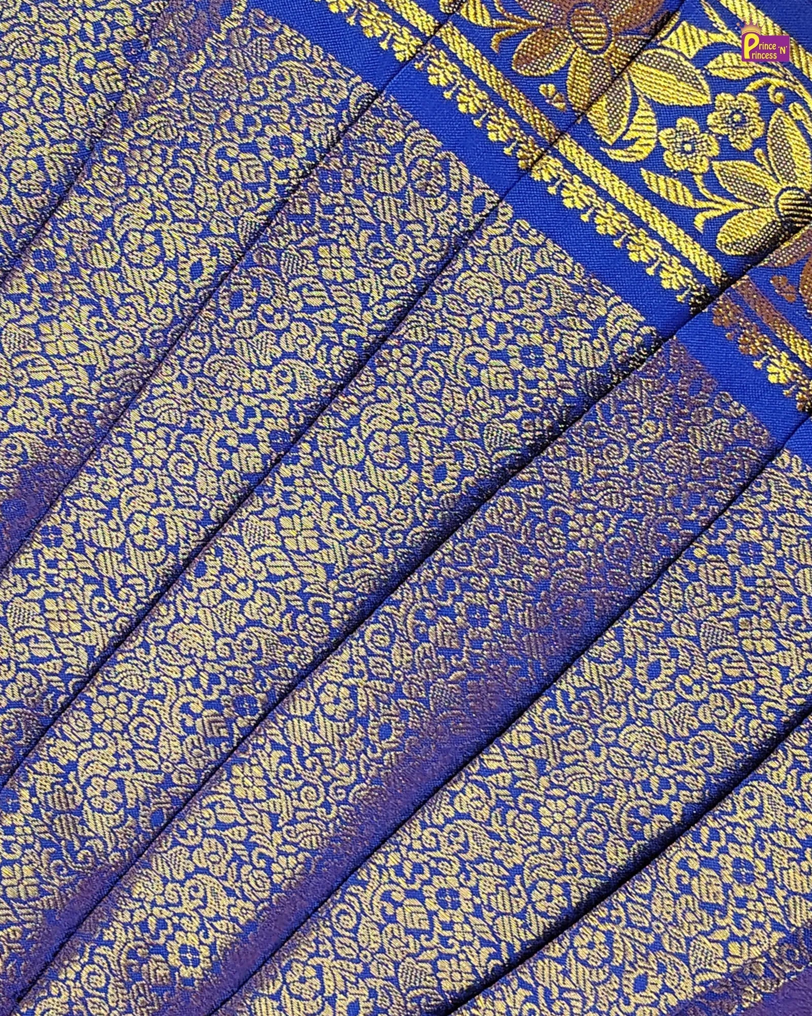Close-up of blue and gold patterned fabric