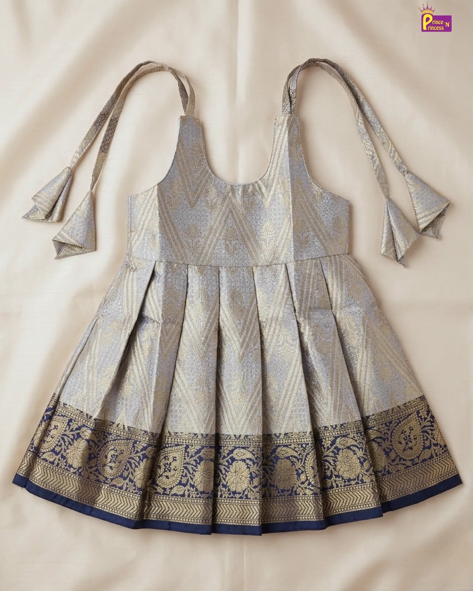 Flat fabric bow shoulder knot closure of silver grey Banarasi silk frock from Prince N Princess newborn naming ceremony collection