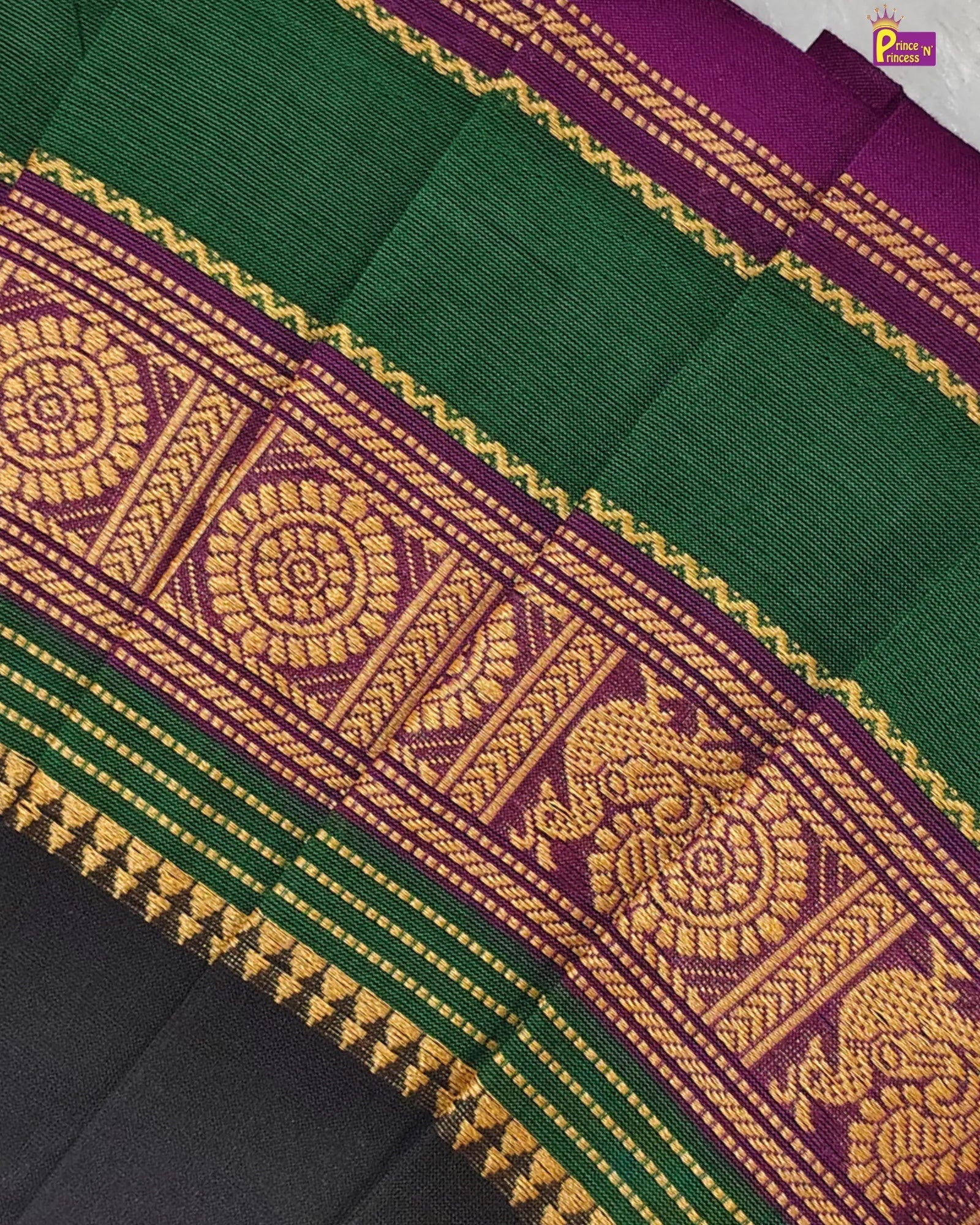 Green and purple fabric with gold embroidery