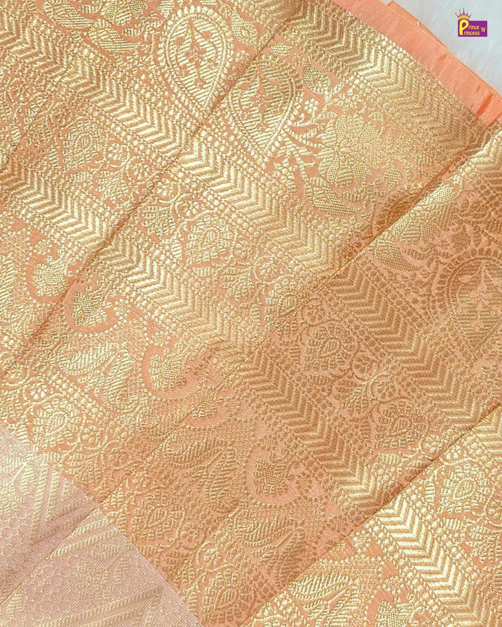 Patterned fabric with gold and peach colors Banarasi silk
