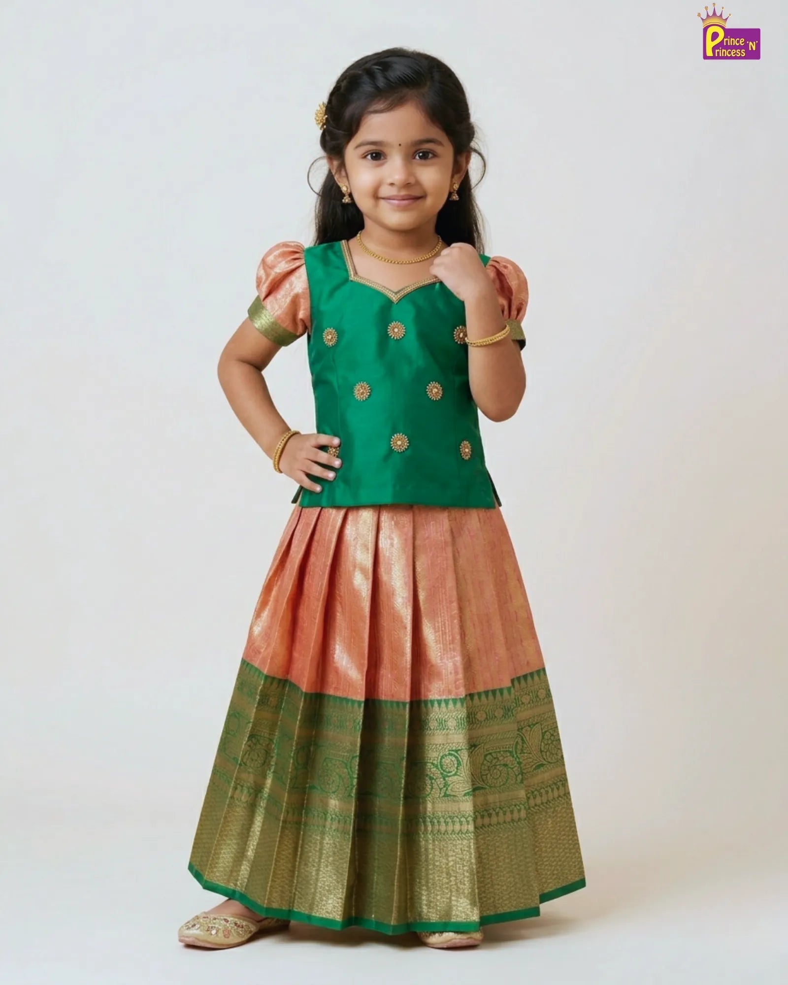 Girl wearing green raw silk pattu pavadai with banarasi border festive dress