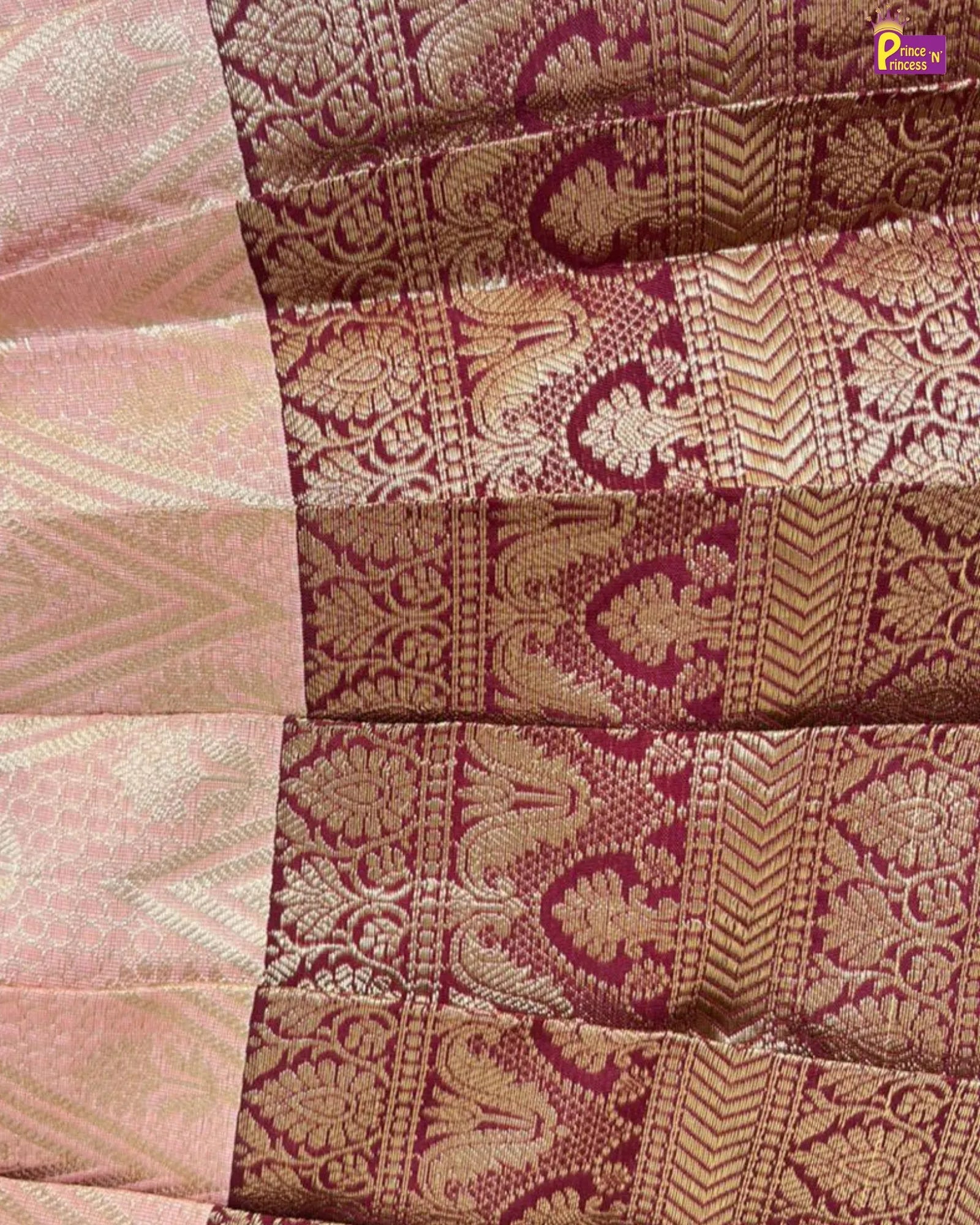 the girl wearing Pattu Pavadai with Aari Work Puff Sleeve