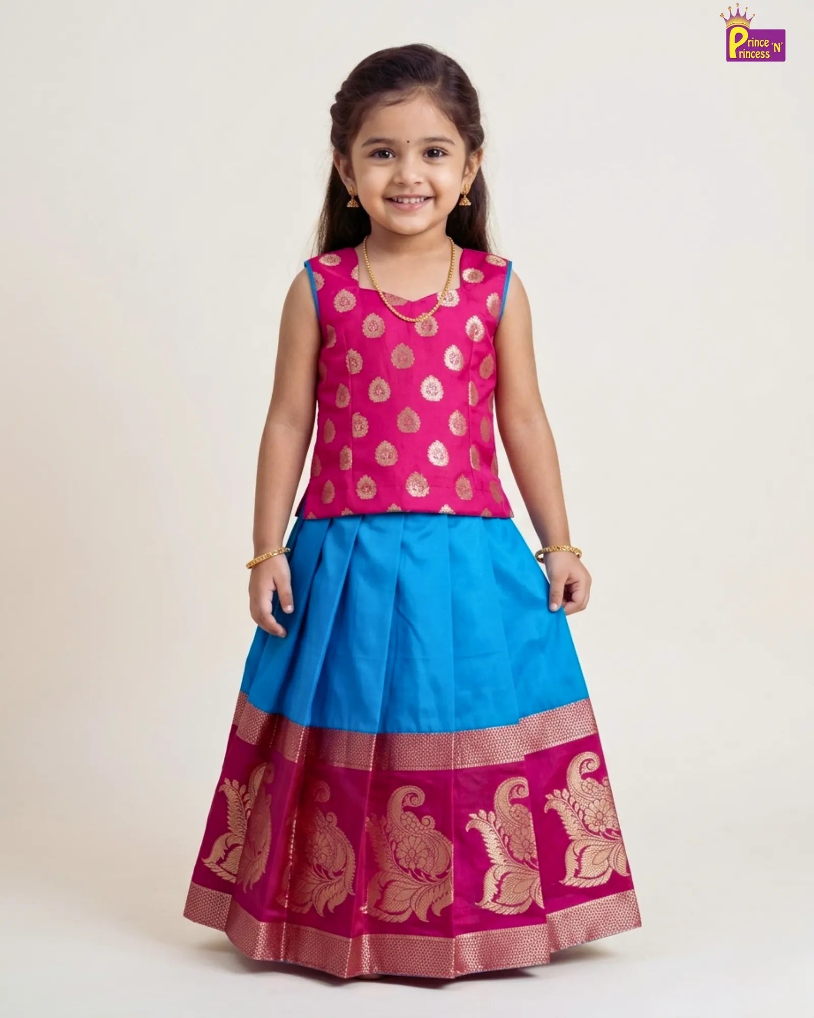 Girl wearing pink and sky blue raw silk Pattu Pavadai with Banarasi border for kids traditional festive wear